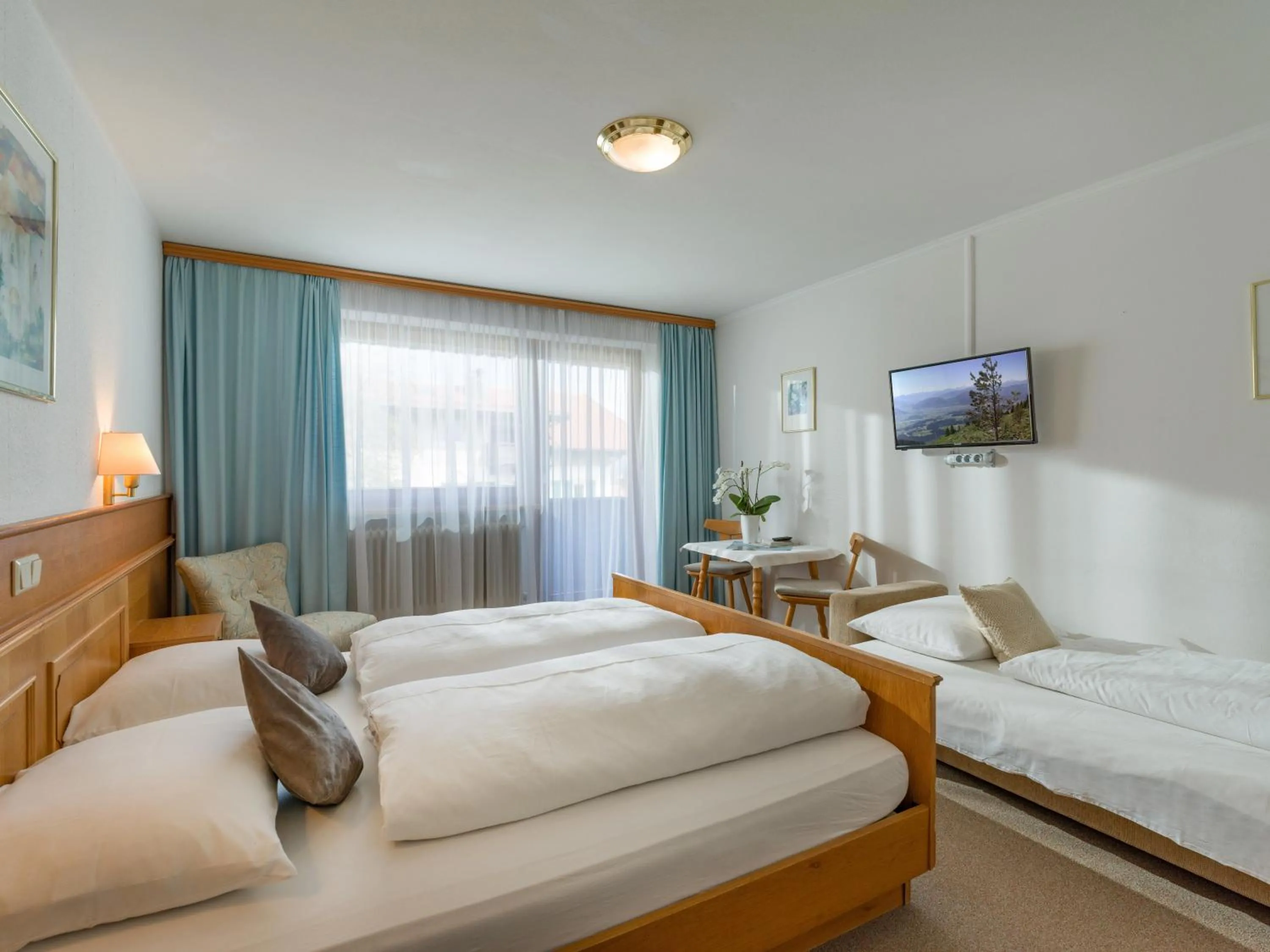 Photo of the whole room, Bed in Hotel Baumgarten & Chalet Baumgarten