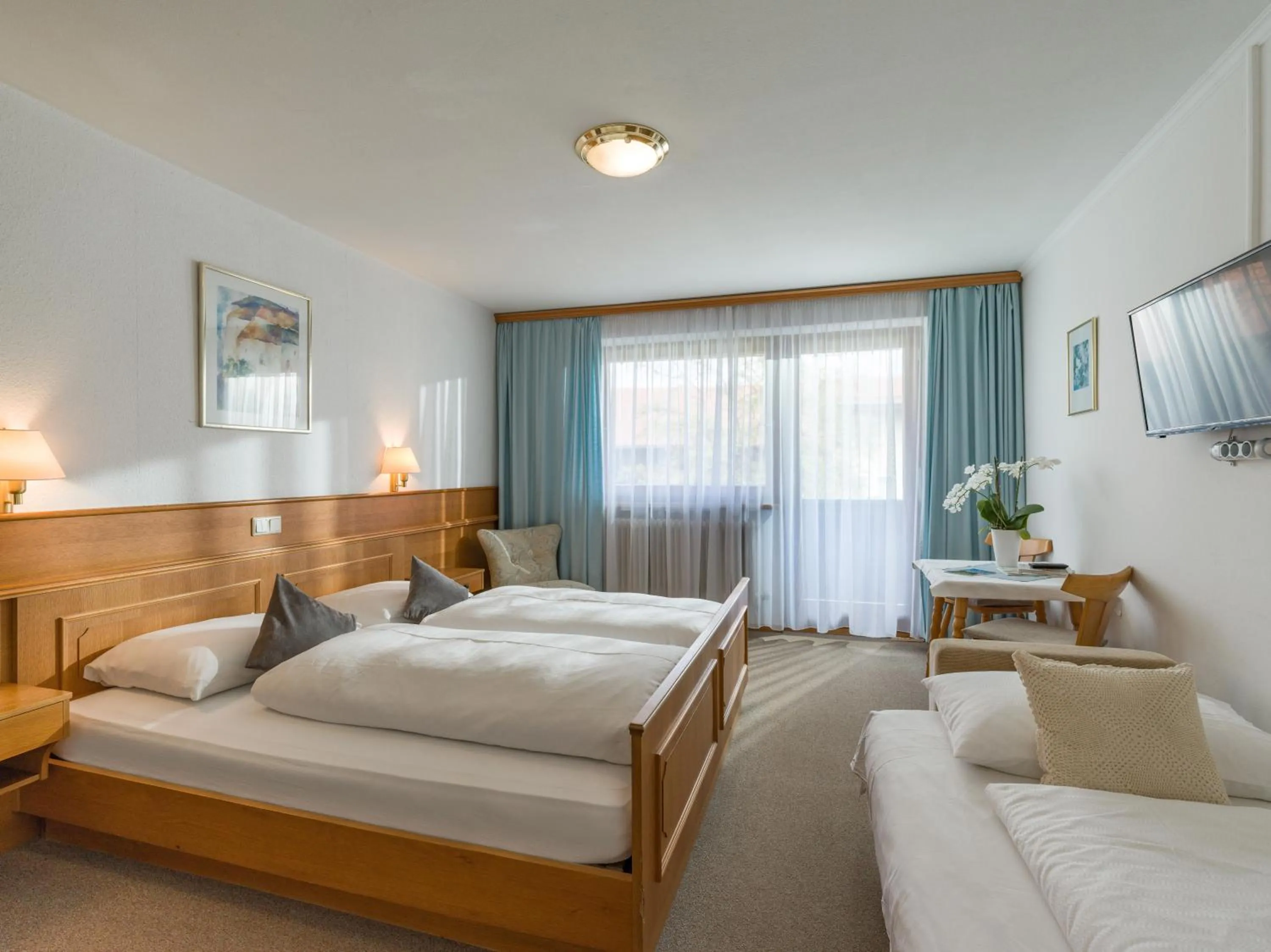 Photo of the whole room, Bed in Hotel Baumgarten & Chalet Baumgarten