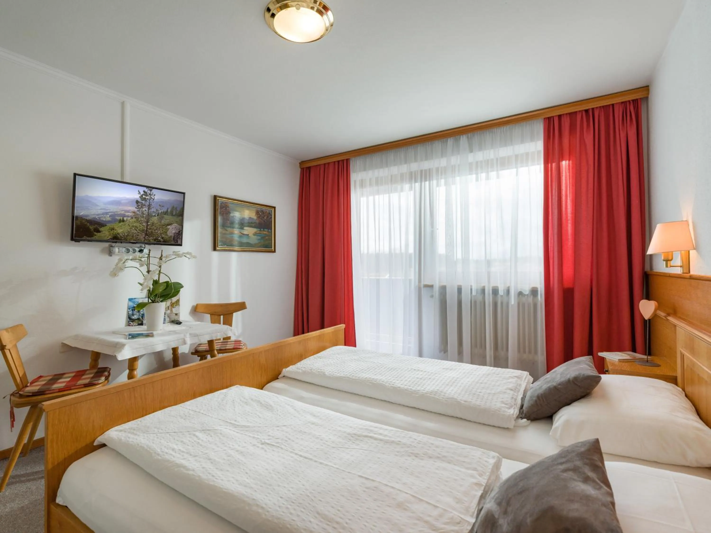 Bed in Hotel Baumgarten & Chalet Baumgarten