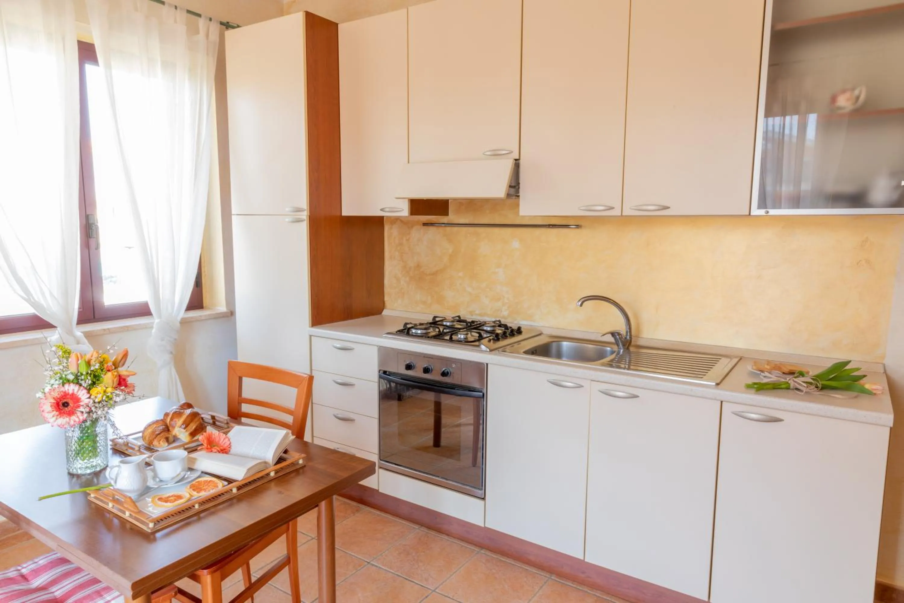 Kitchen or kitchenette in B&B Puerto Seguro