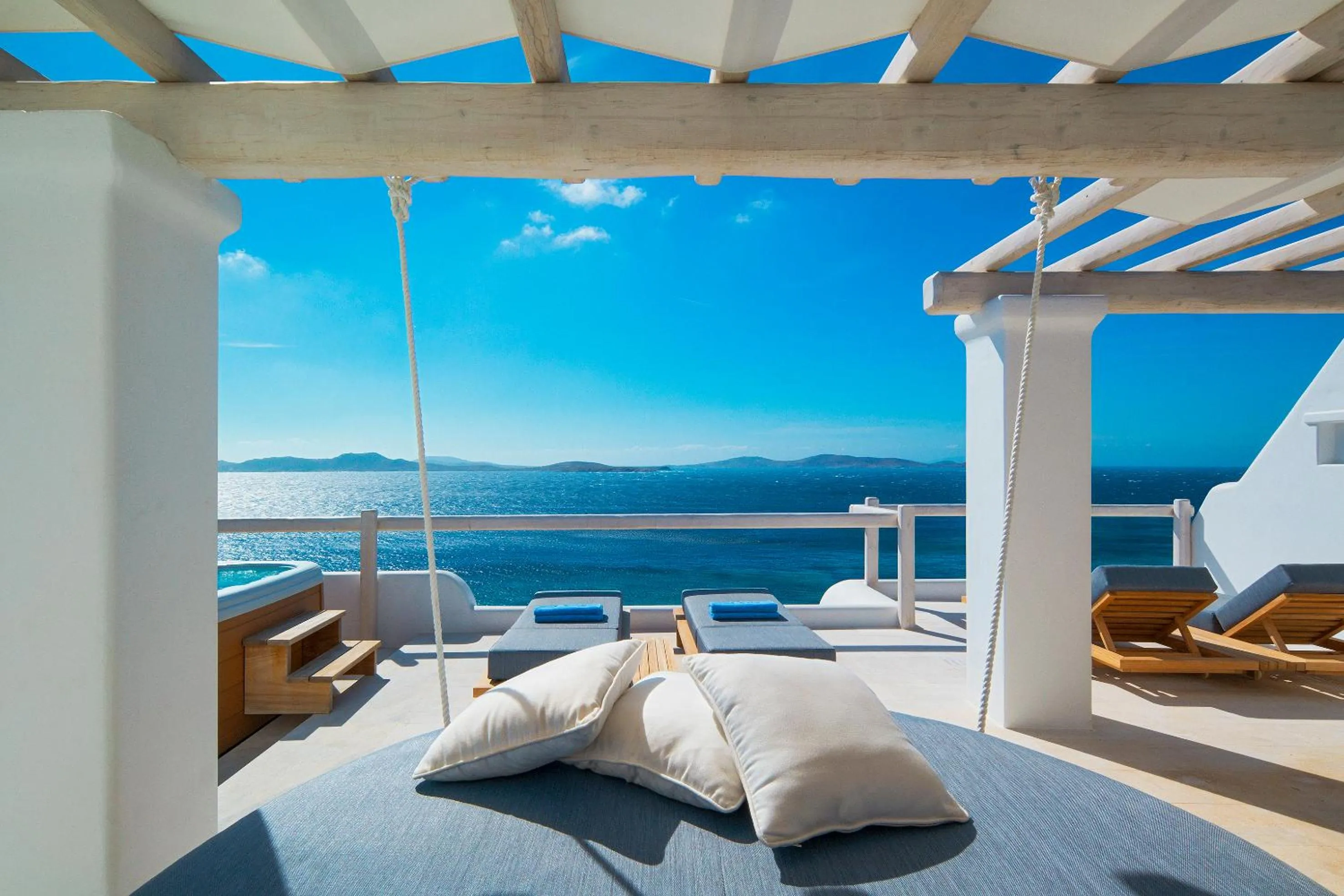 Balcony/Terrace, Bed in Mykonos Grand Hotel & Resort