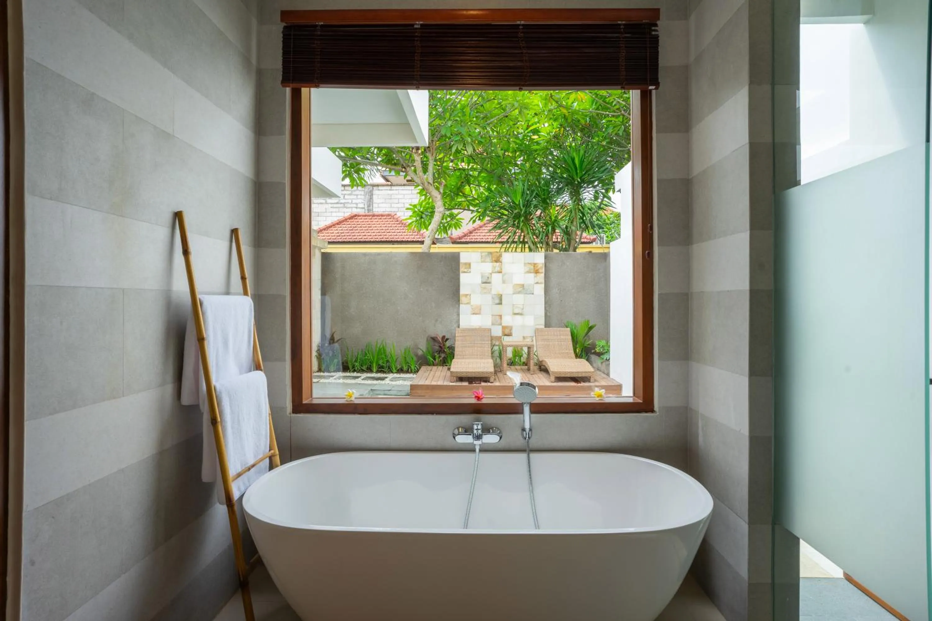 Bathroom in Freddies Resort & Villas Ubud by Kanaya Hospitality