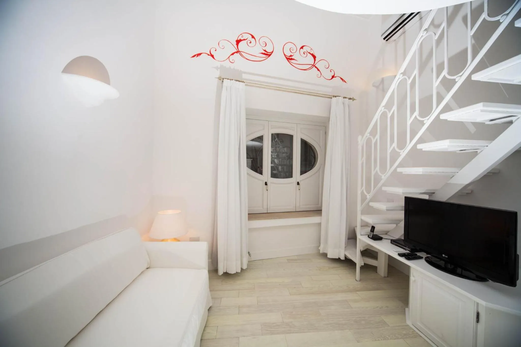 Seating area, Bed in La Settima Luna Hotel