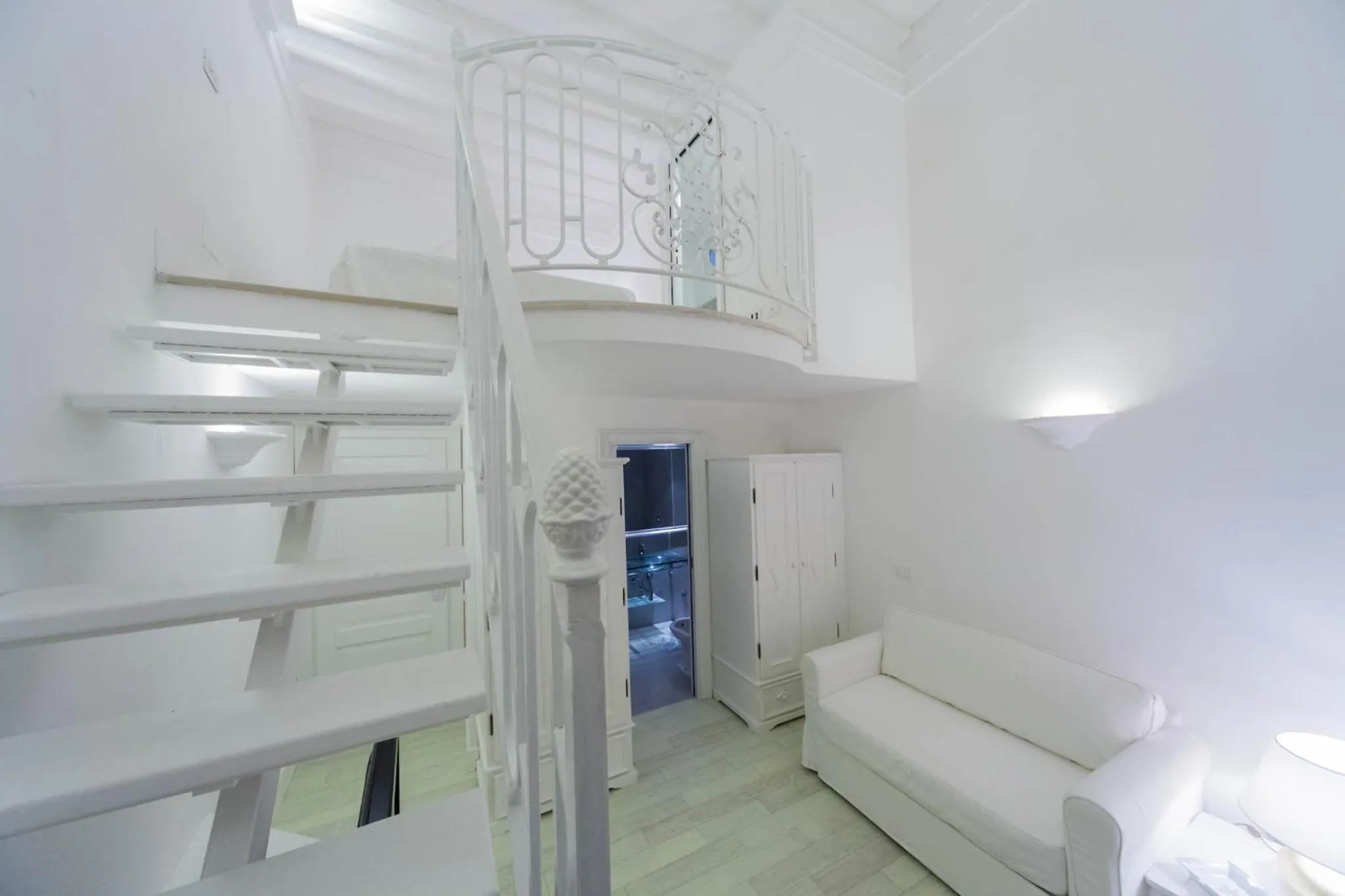 Seating area, Bed in La Settima Luna Hotel