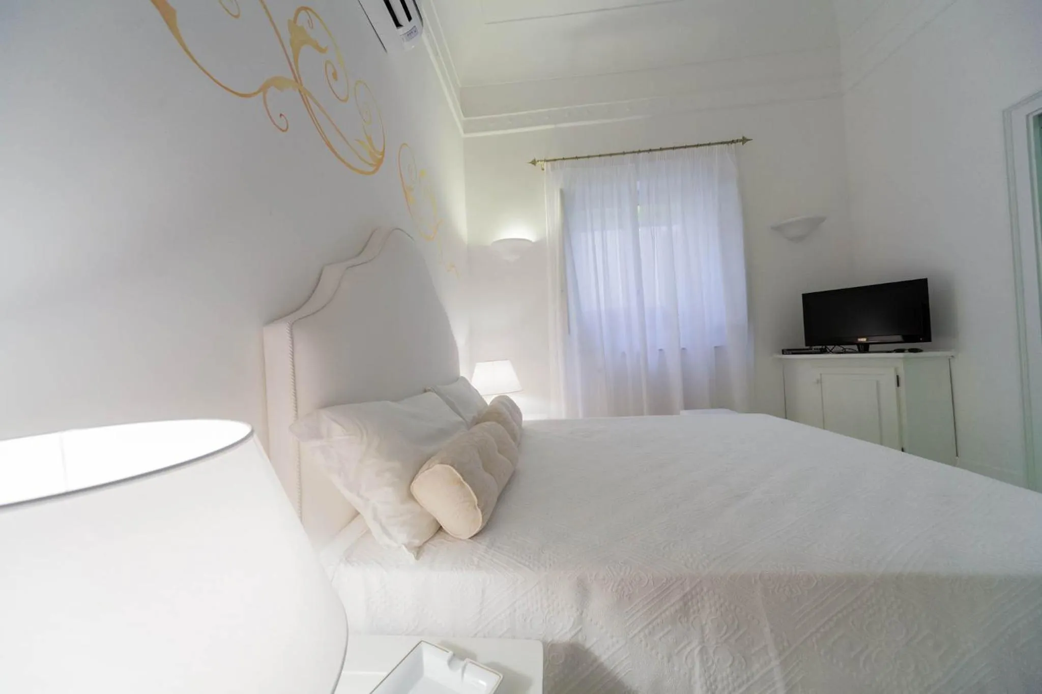 Bed in La Settima Luna Hotel