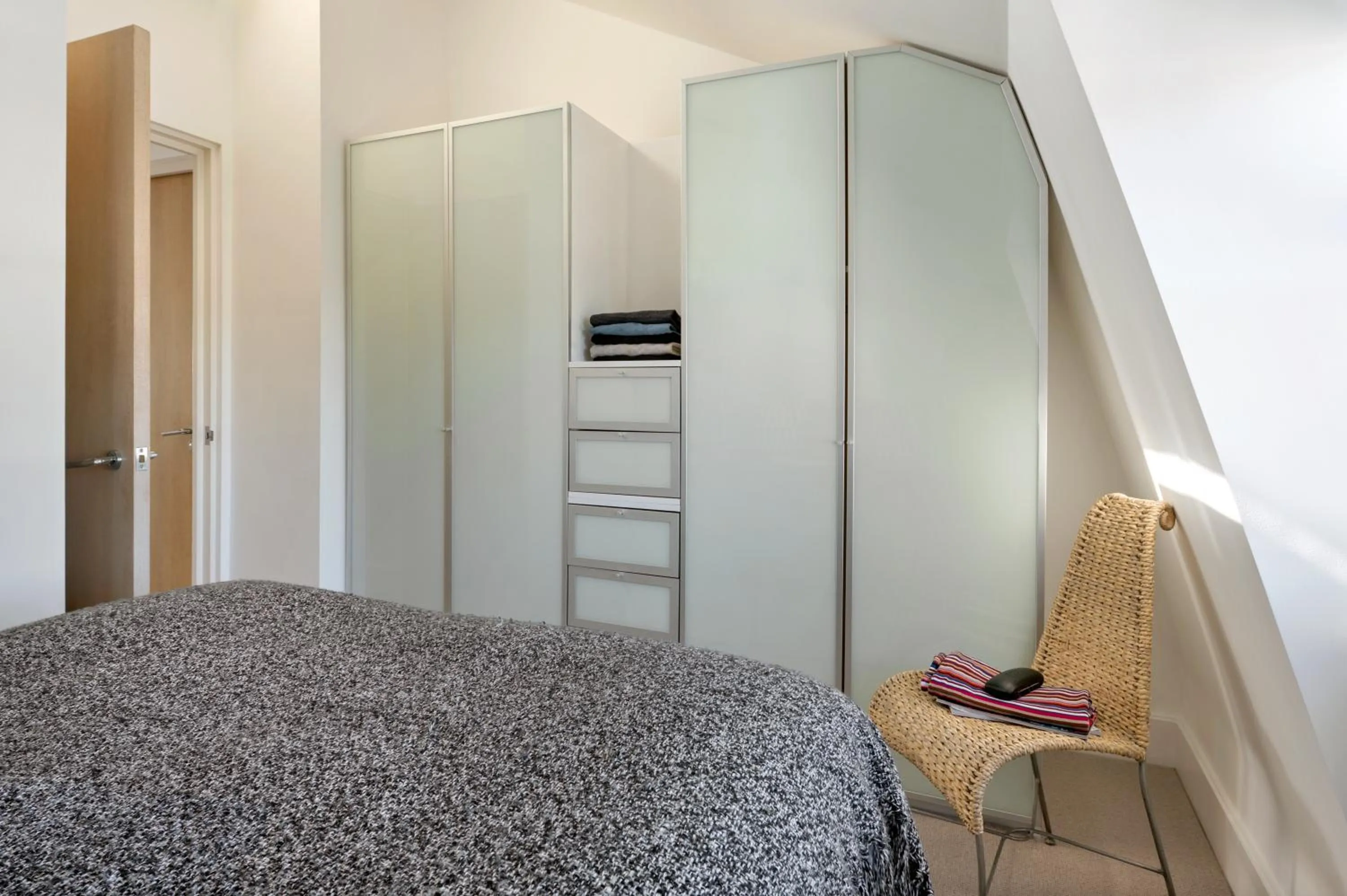 Bedroom in Nevern Place by Supercity Aparthotels