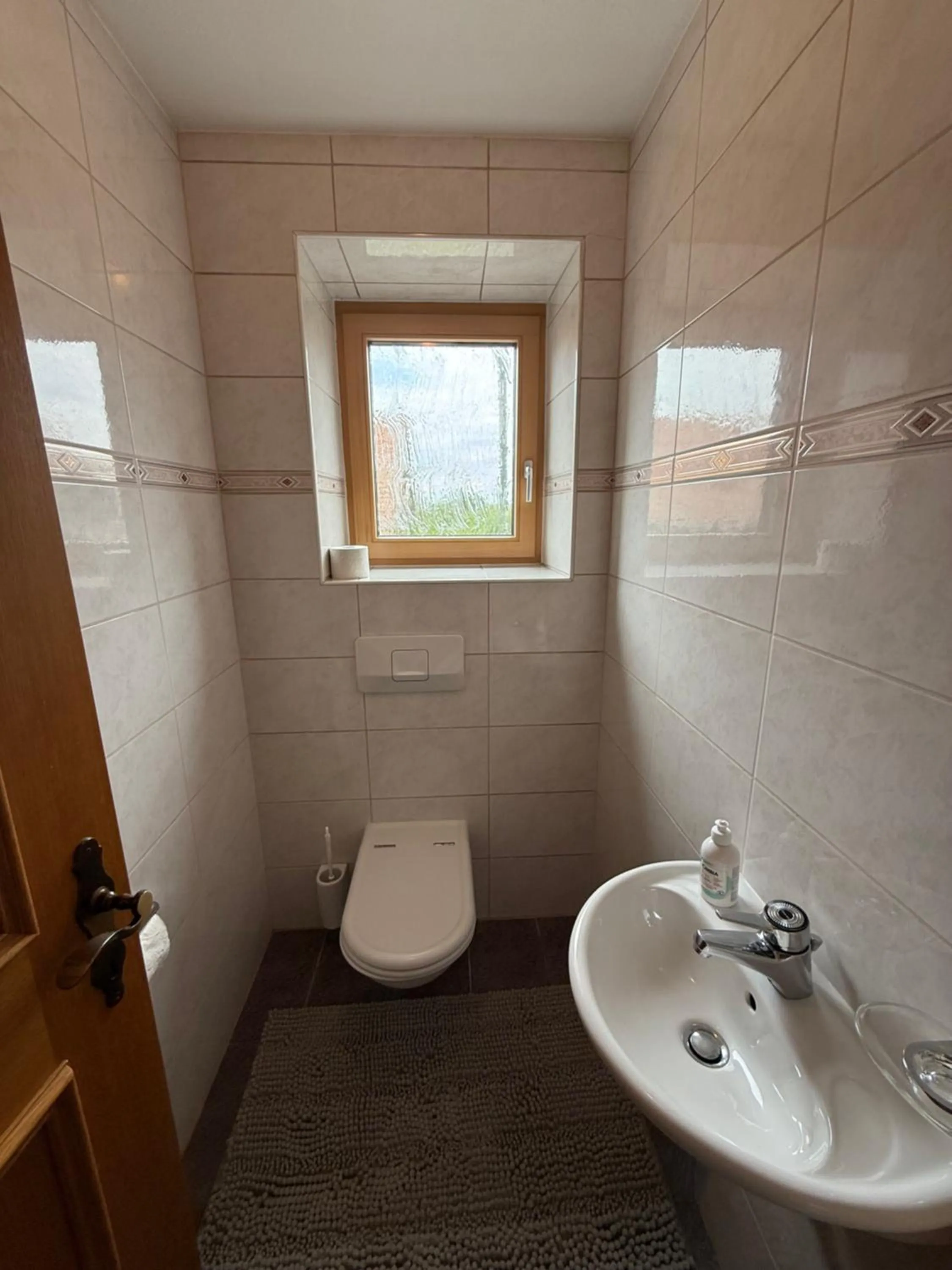 Toilet in Gasthof Meindl - Self-Check-In mit 24h Telefon Support