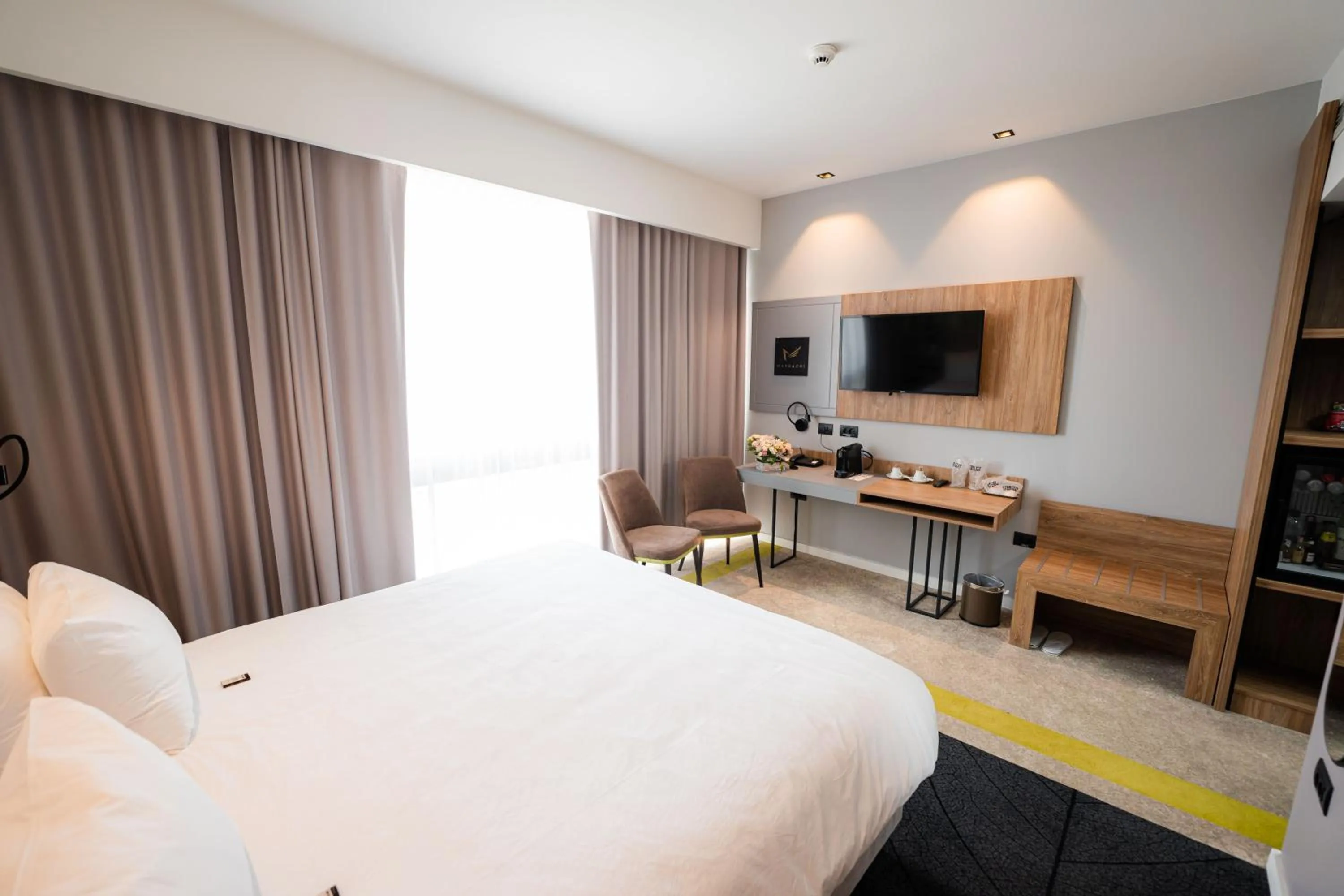 Bed in Mandachi Hotel & SPA