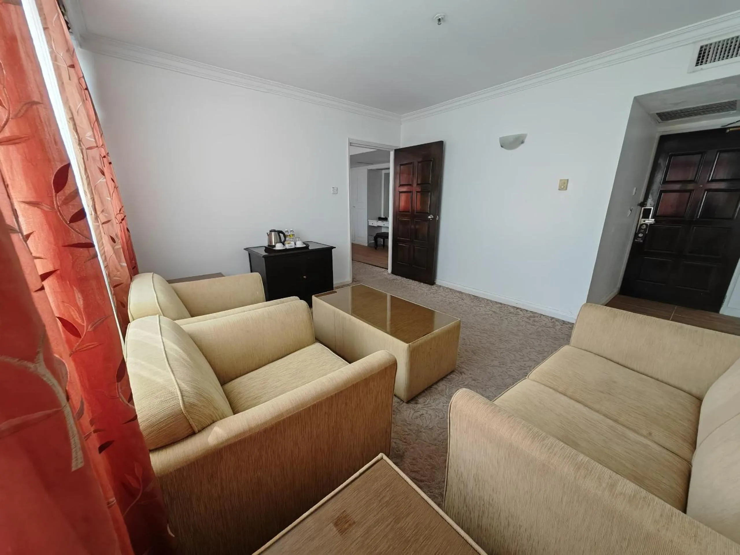 Living room in The Putra Regency Hotel