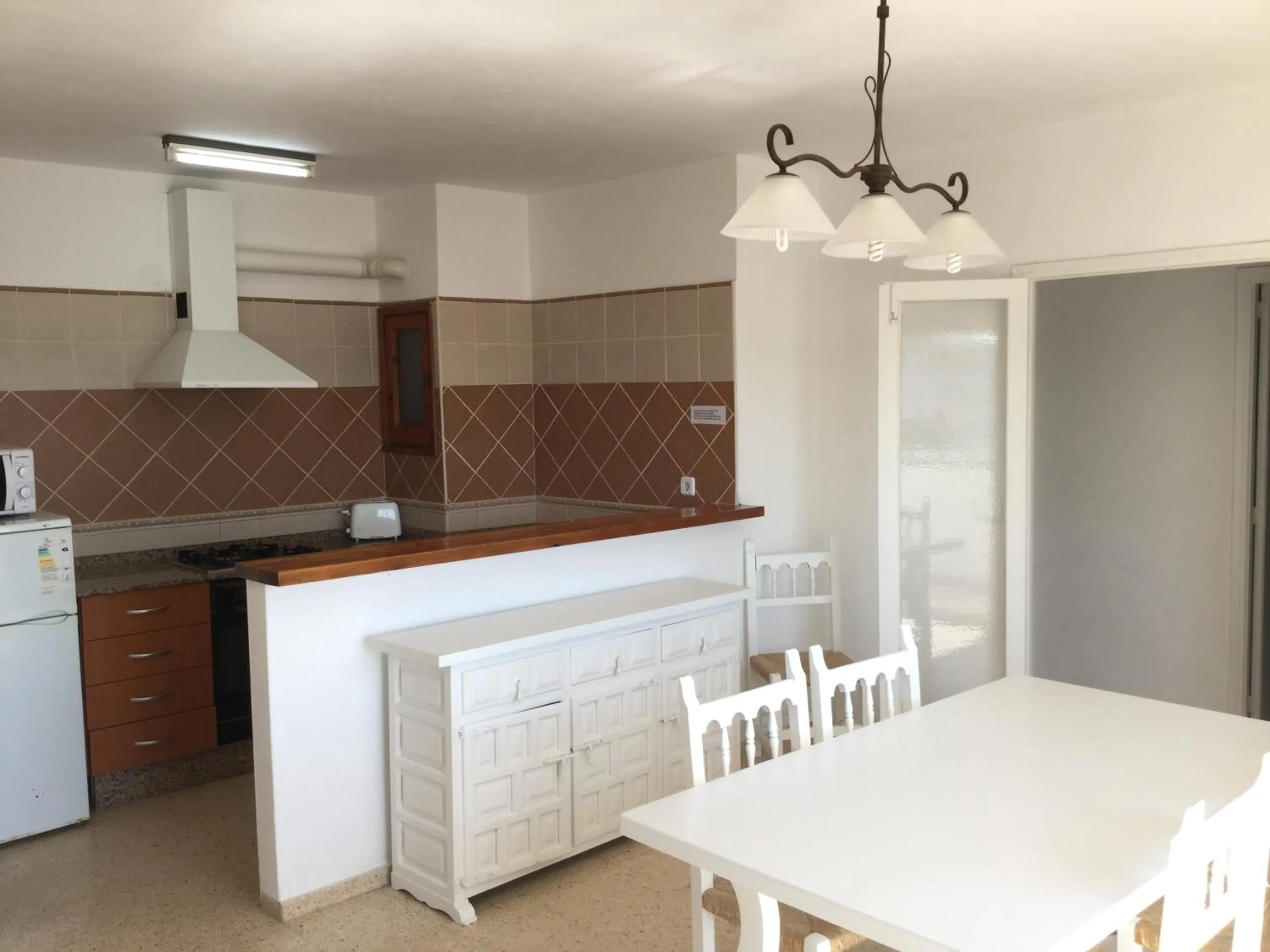 Kitchen or kitchenette in Apartamentos Alba