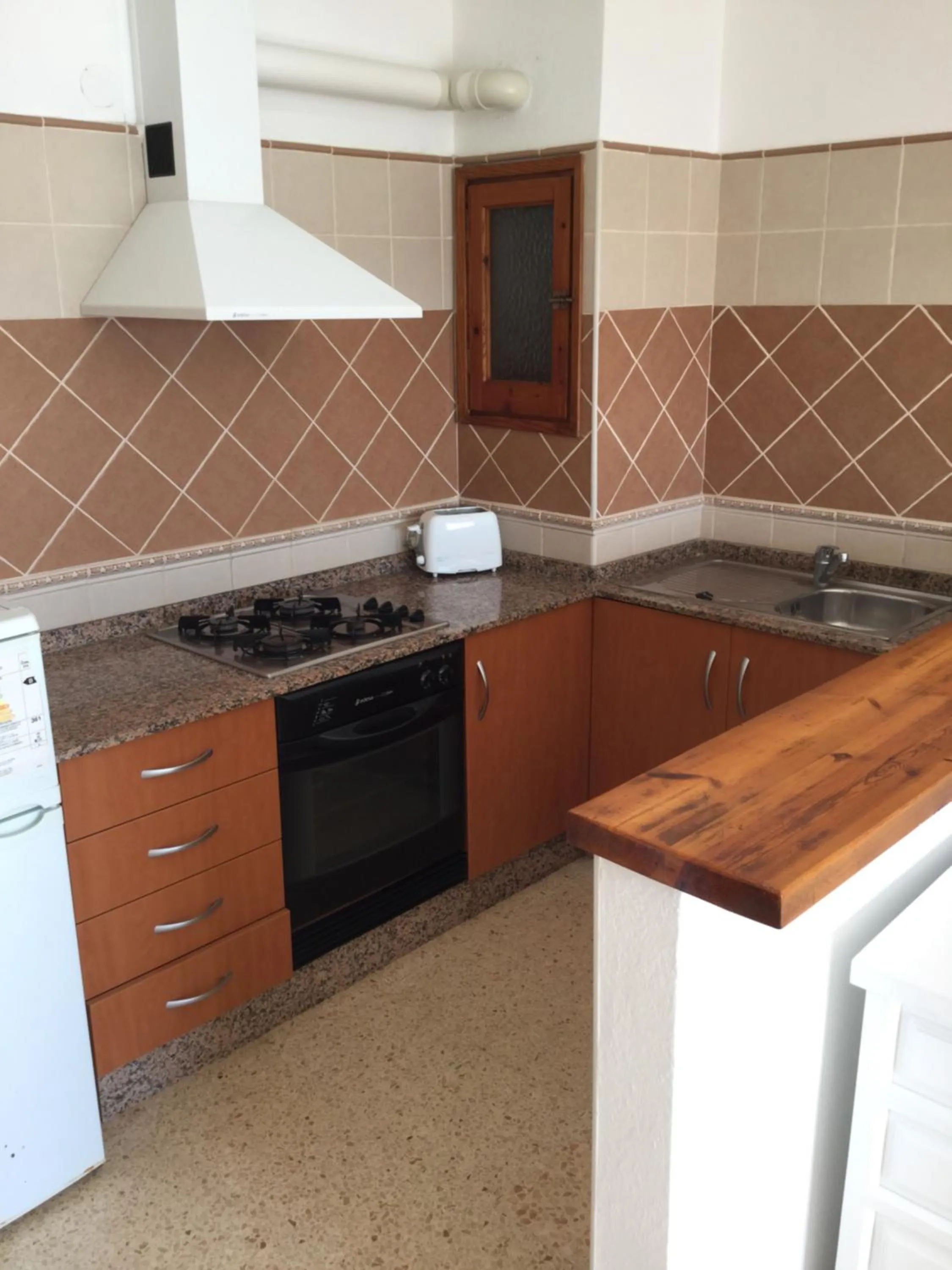 Kitchen or kitchenette in Apartamentos Alba