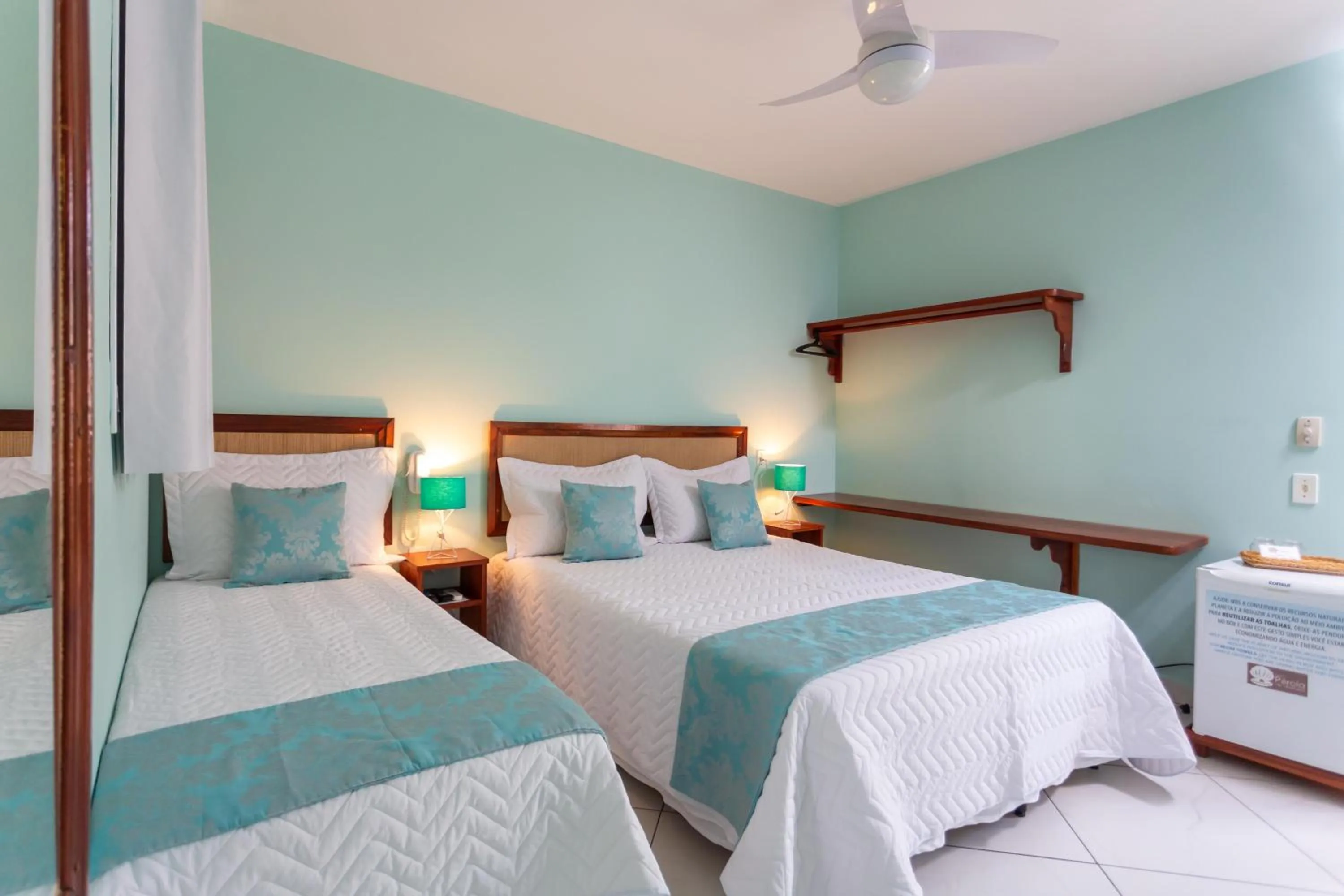 Bed in Pousada Pérola de Ubatuba