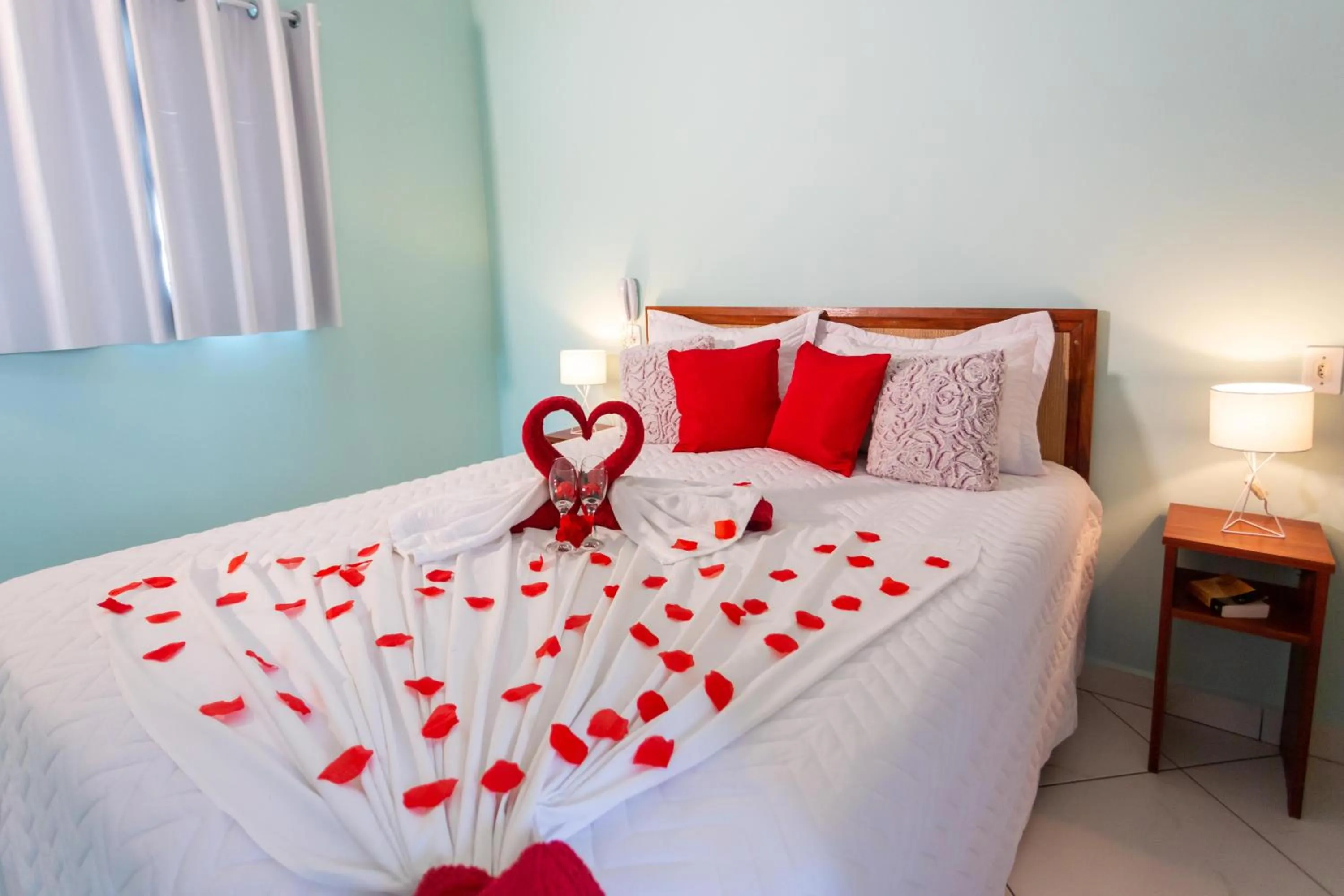 Bed in Pousada Pérola de Ubatuba