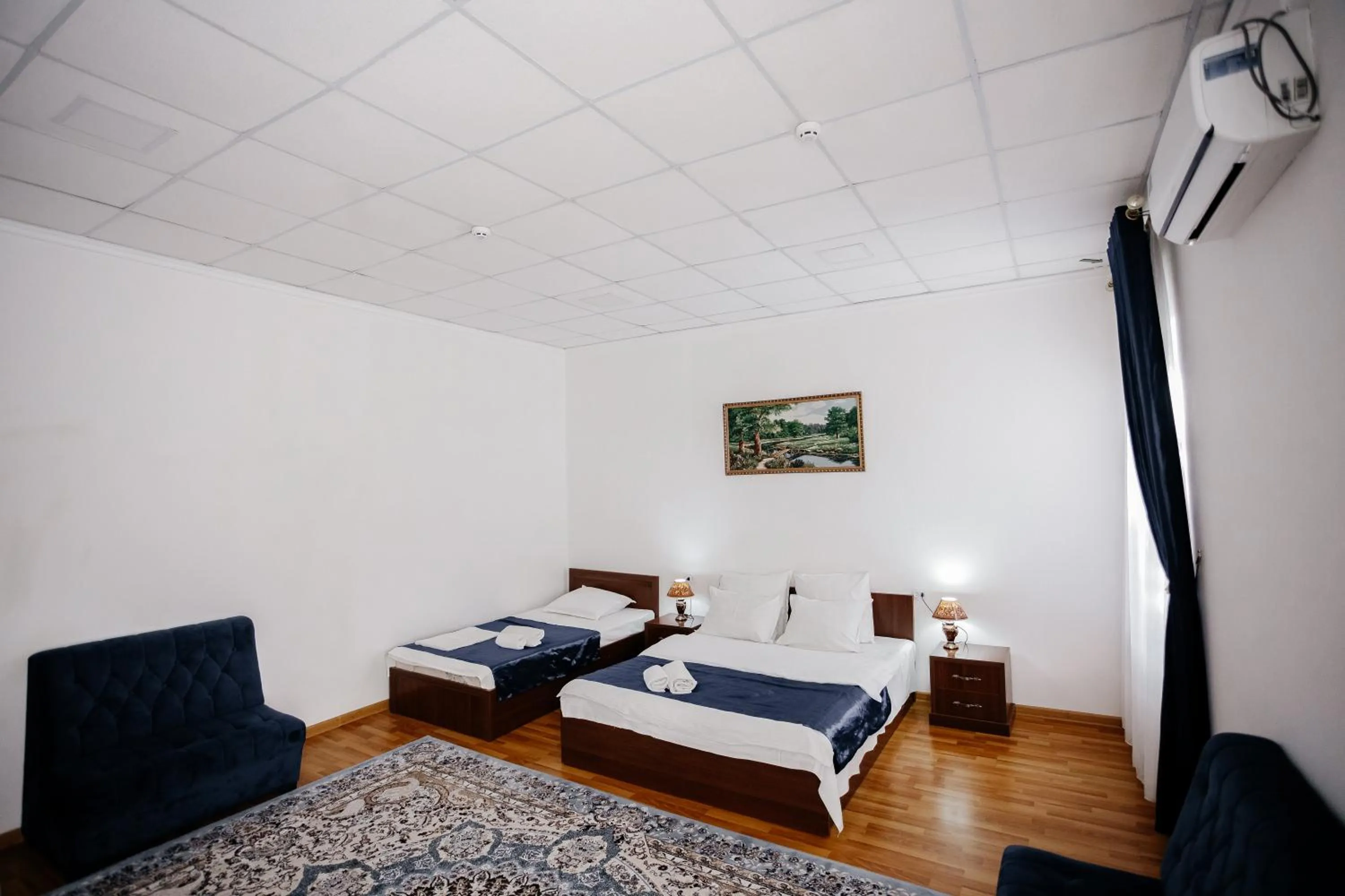 Bed in Karakalpak Palace Hotel