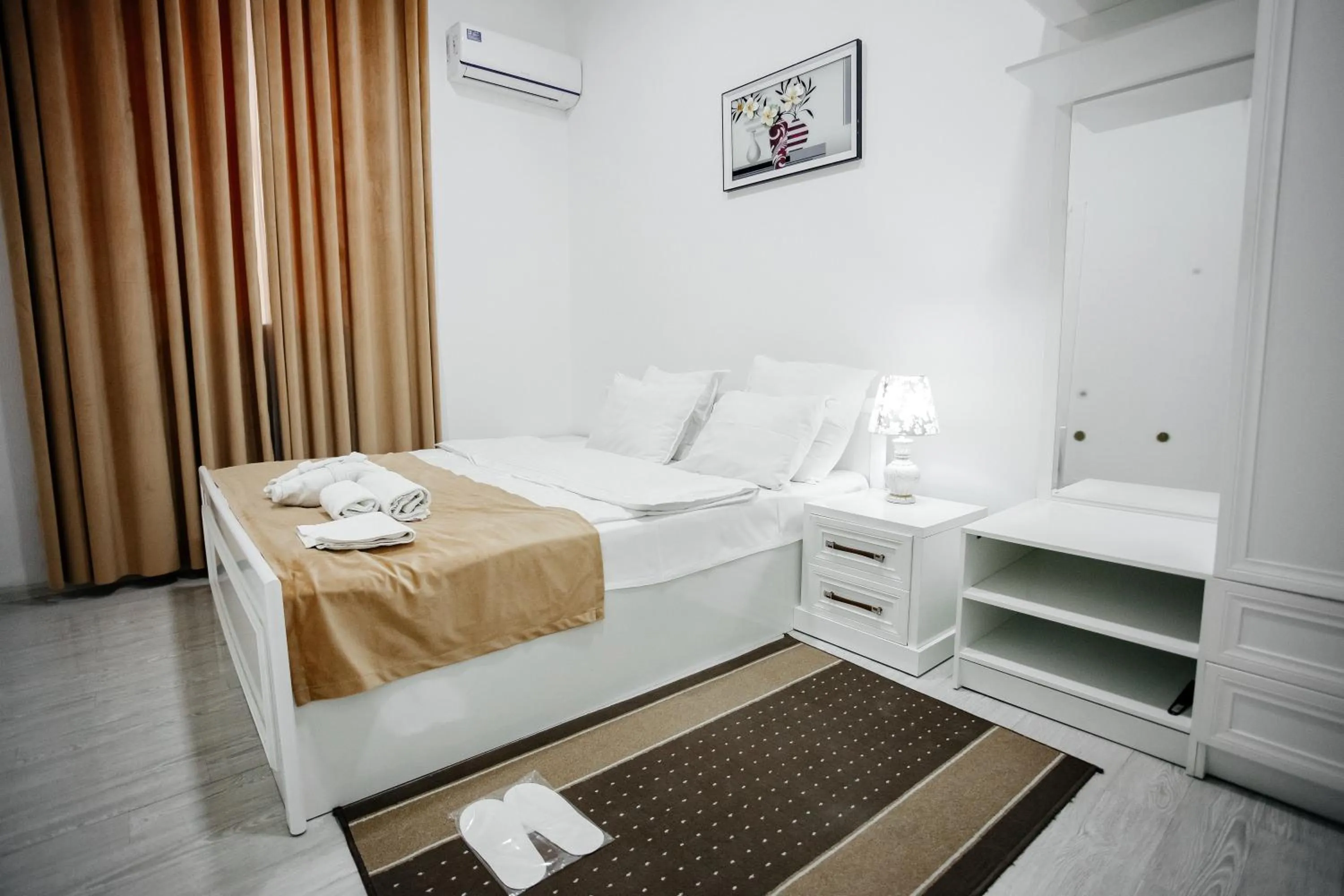 Bed in Karakalpak Palace Hotel