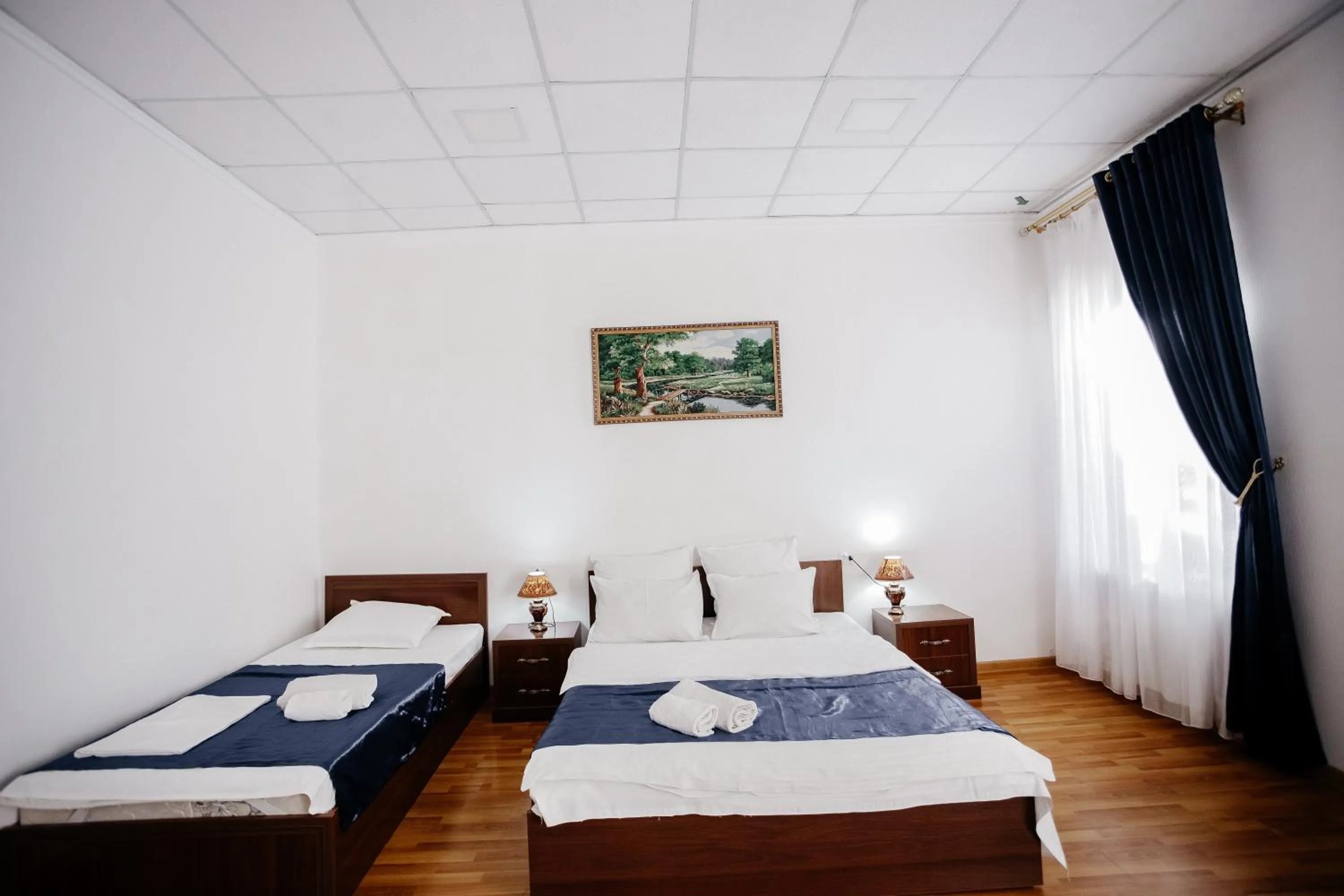 Bed in Karakalpak Palace Hotel