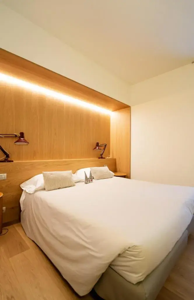 Deluxe Triple Room in Albergo Sorriso Deluxe Triple Room in Albergo Sorriso