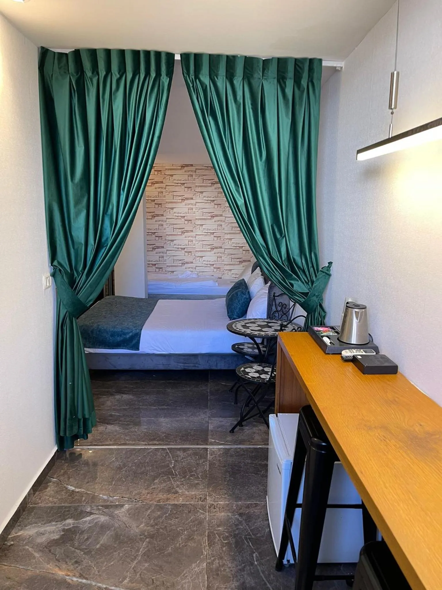 Bed in Lago Suites Hotel