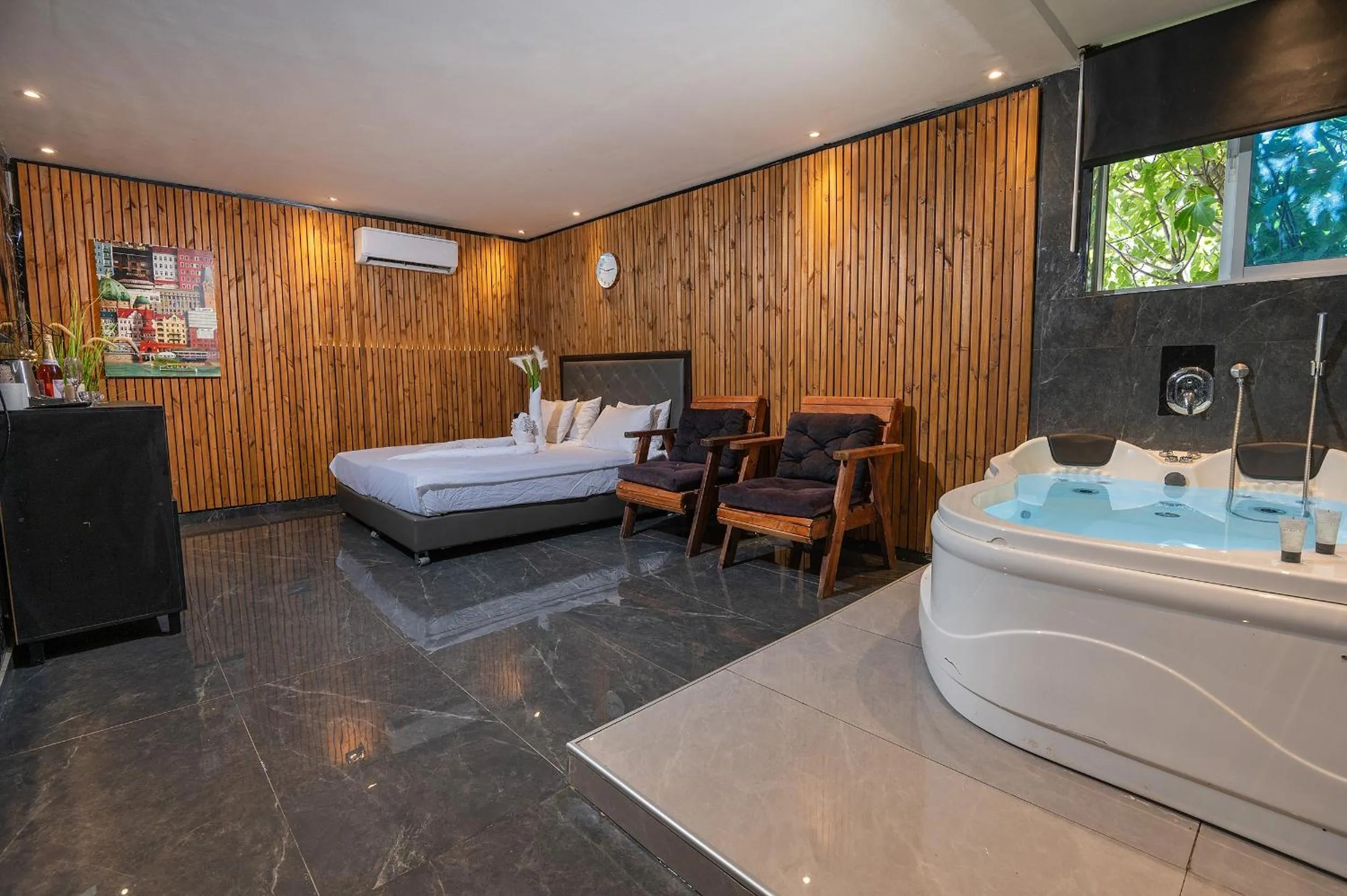 Bed in Lago Suites Hotel