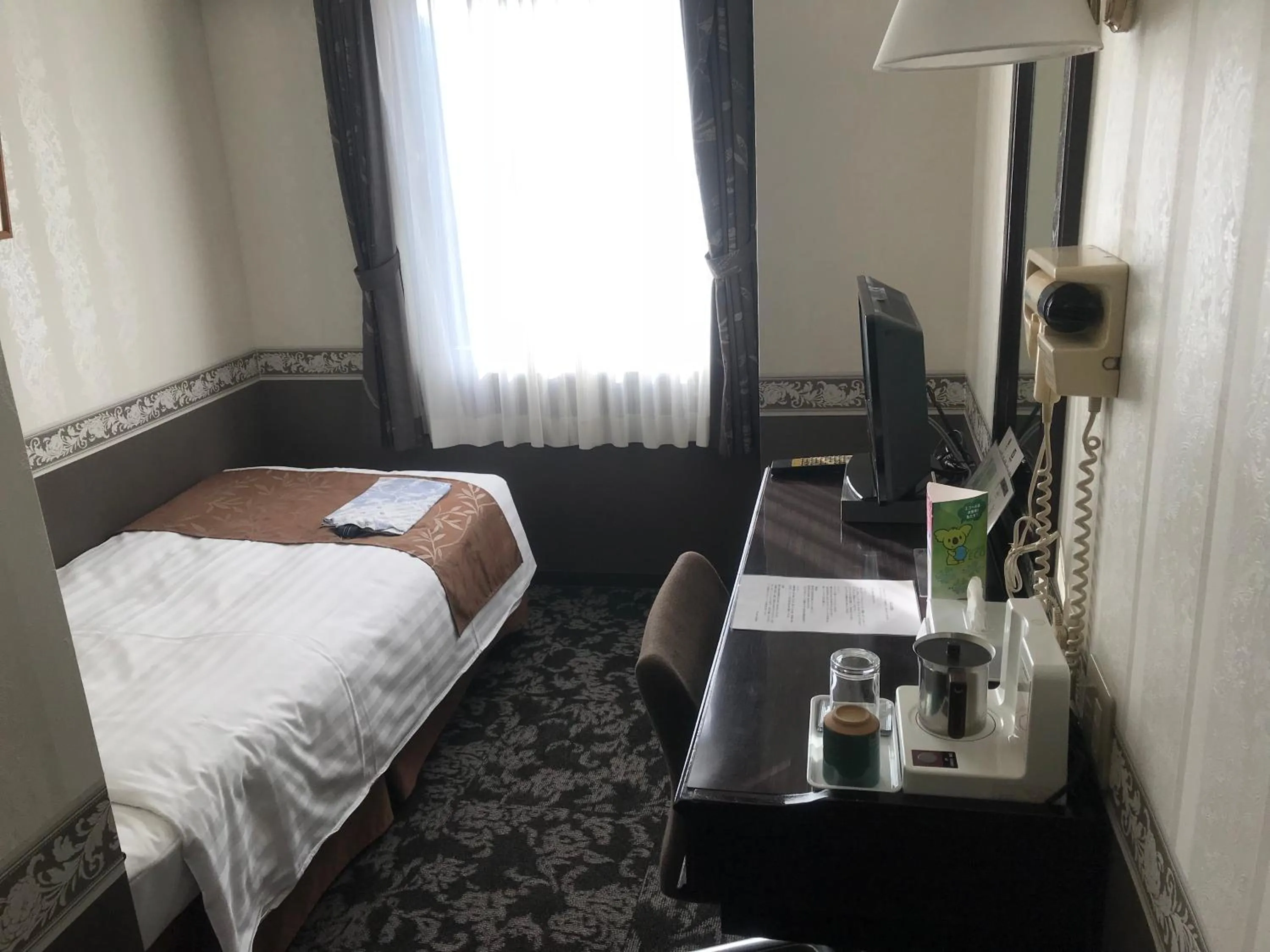 Living room, Bed in Hotel Crown Hills Kamaishi