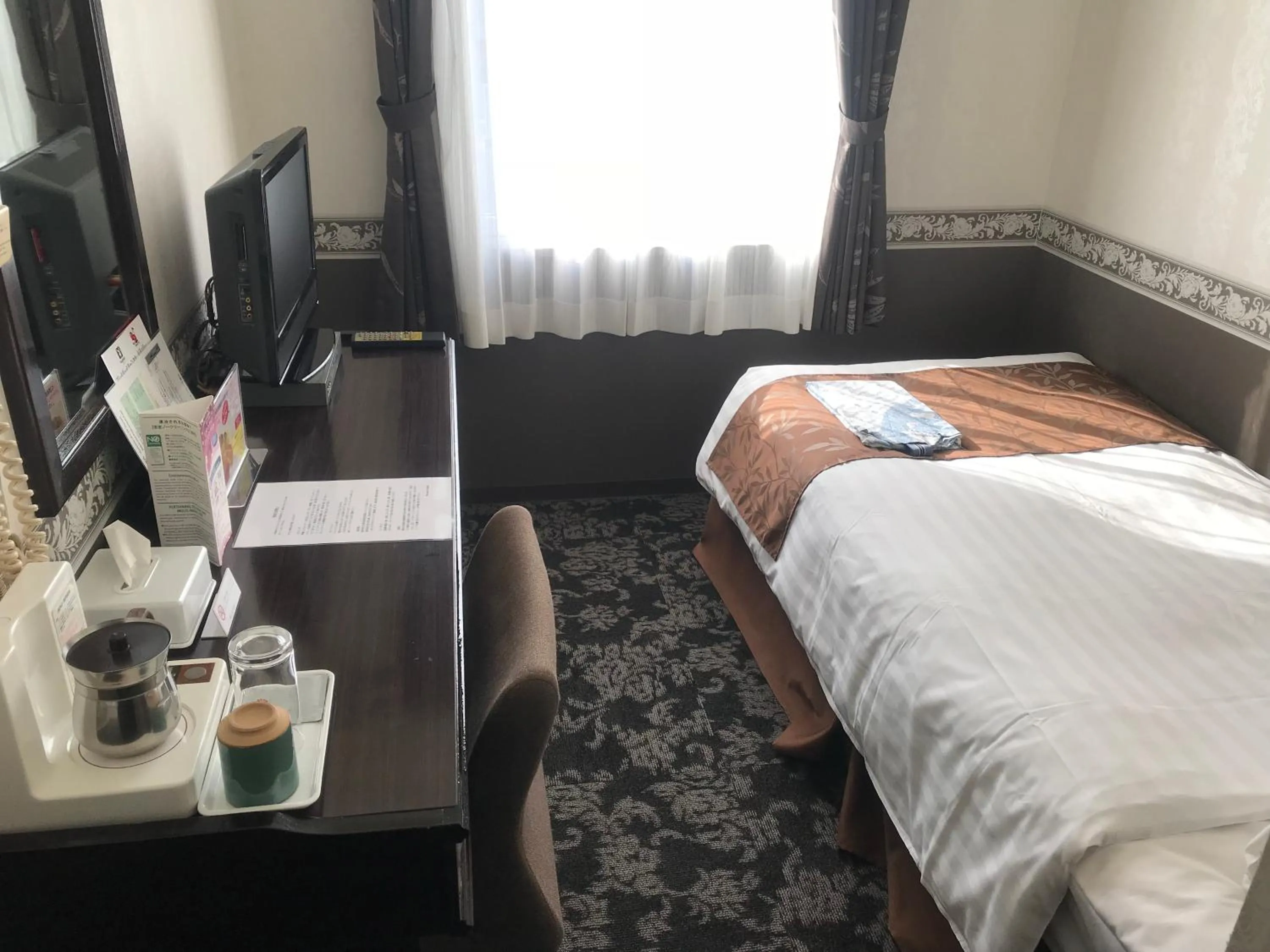 Living room, Bed in Hotel Crown Hills Kamaishi