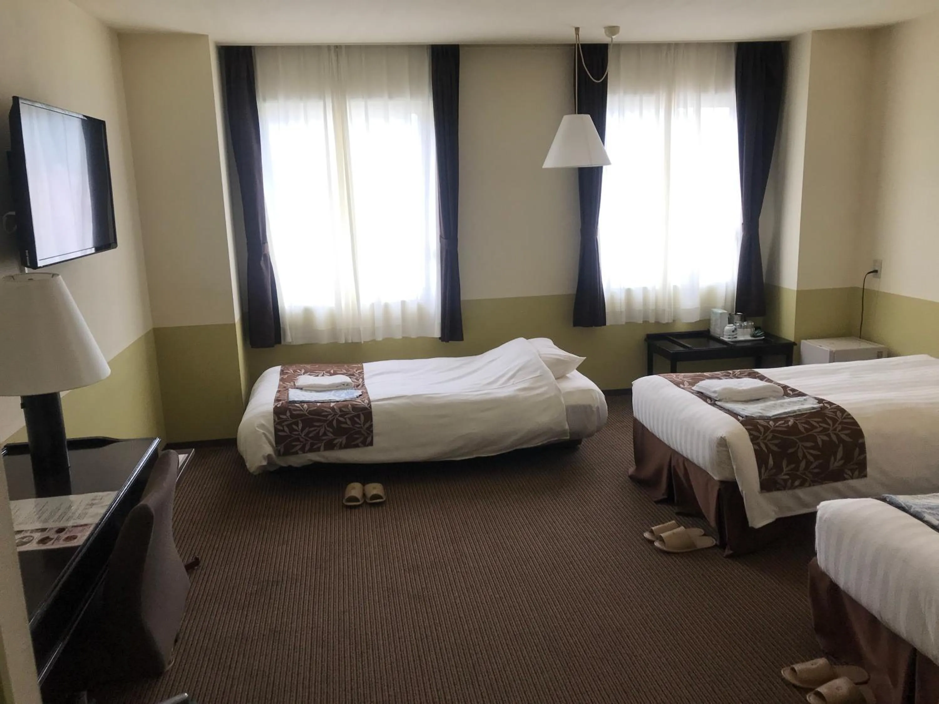 Living room, Bed in Hotel Crown Hills Kamaishi