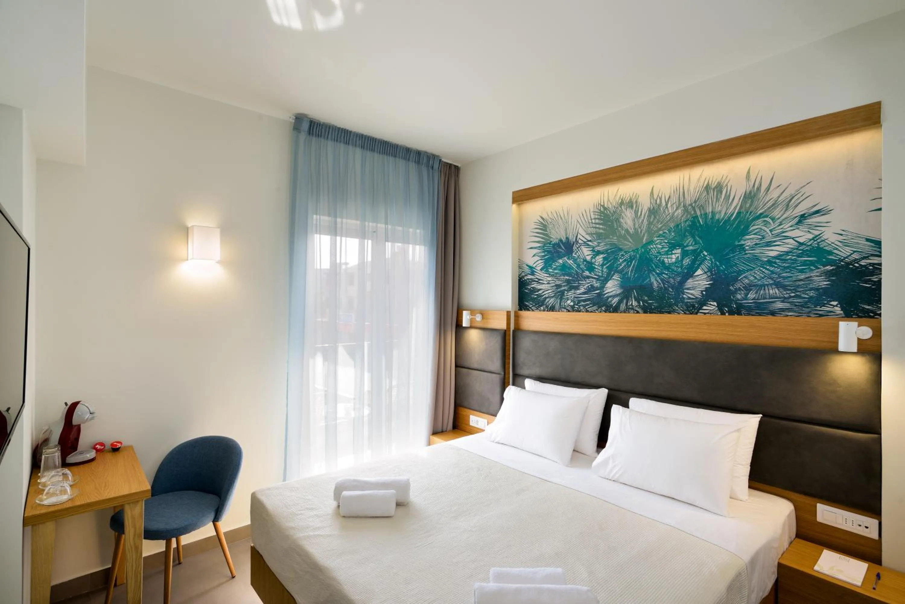 Bed in Elia Kalamaki Hotel