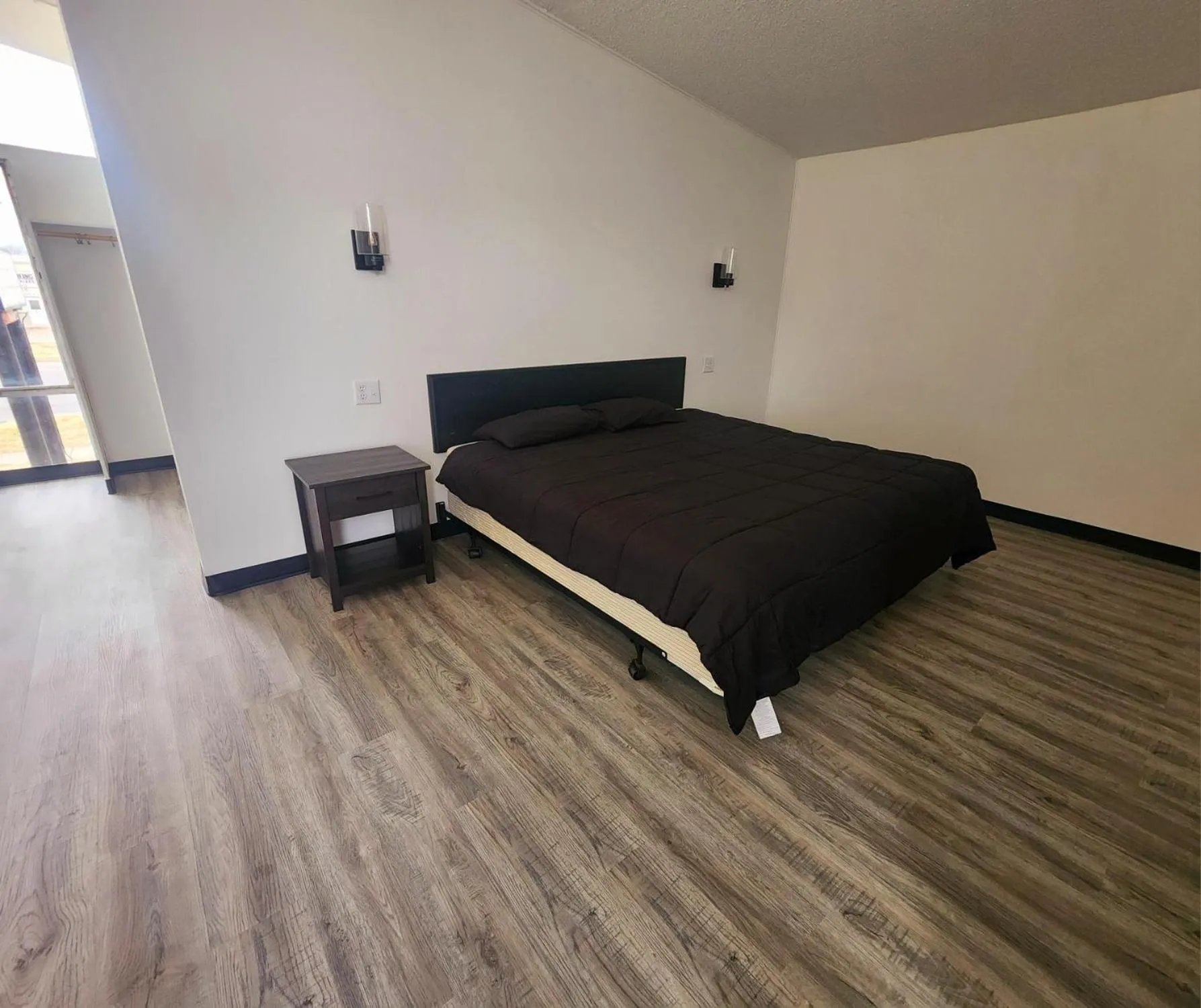 Bed in The Hastings Inn Salina