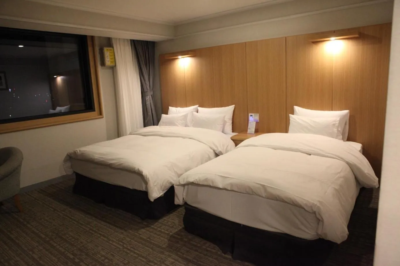 Bed in Hotel Dongbang