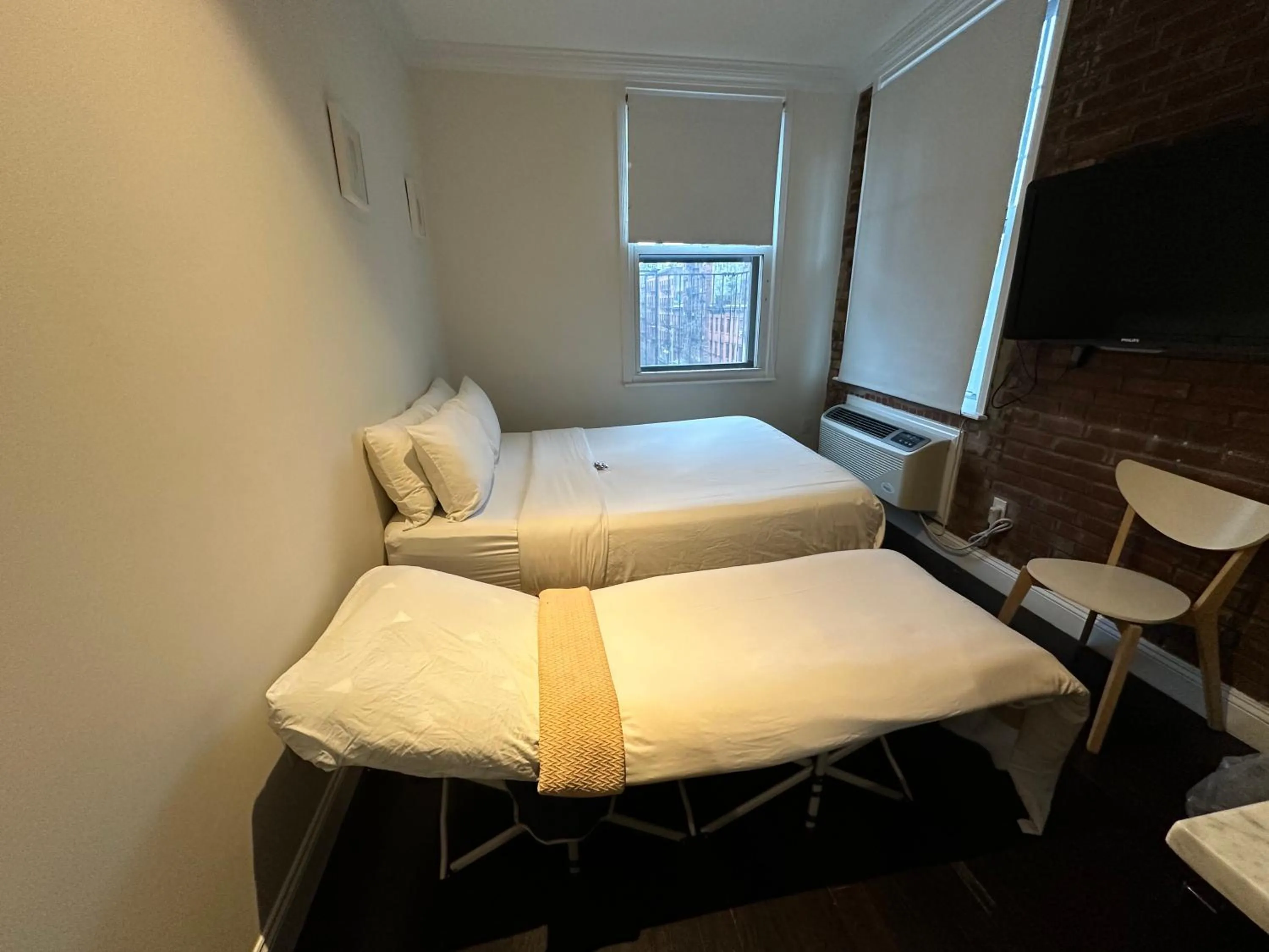 Bed in East Village Hotel