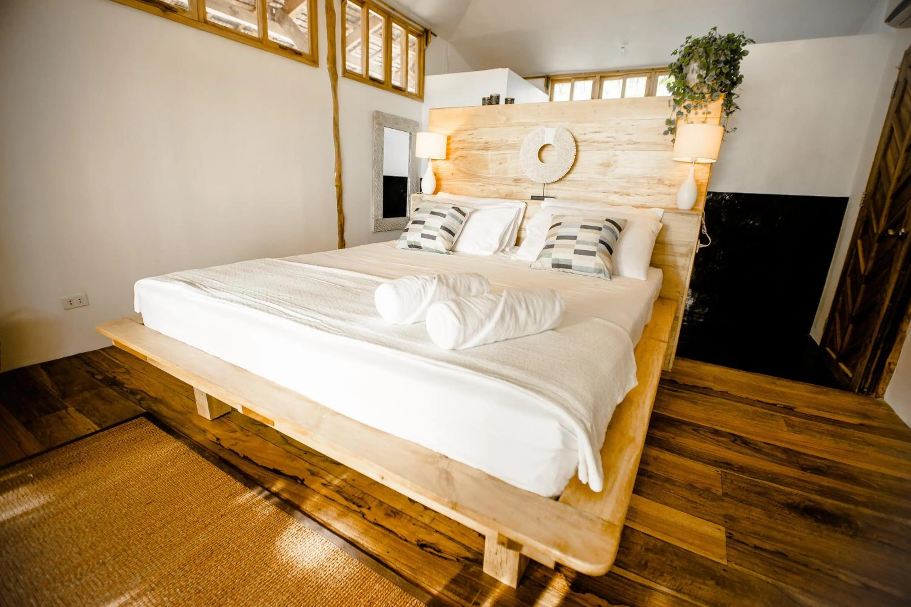 Bed in Maligaya Beach Bungalows