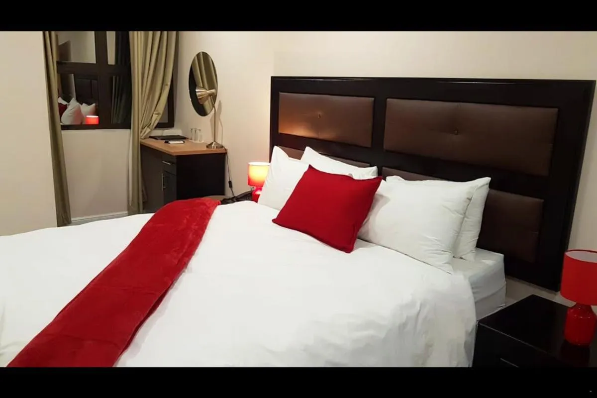 Bed in Garden Top Hotel