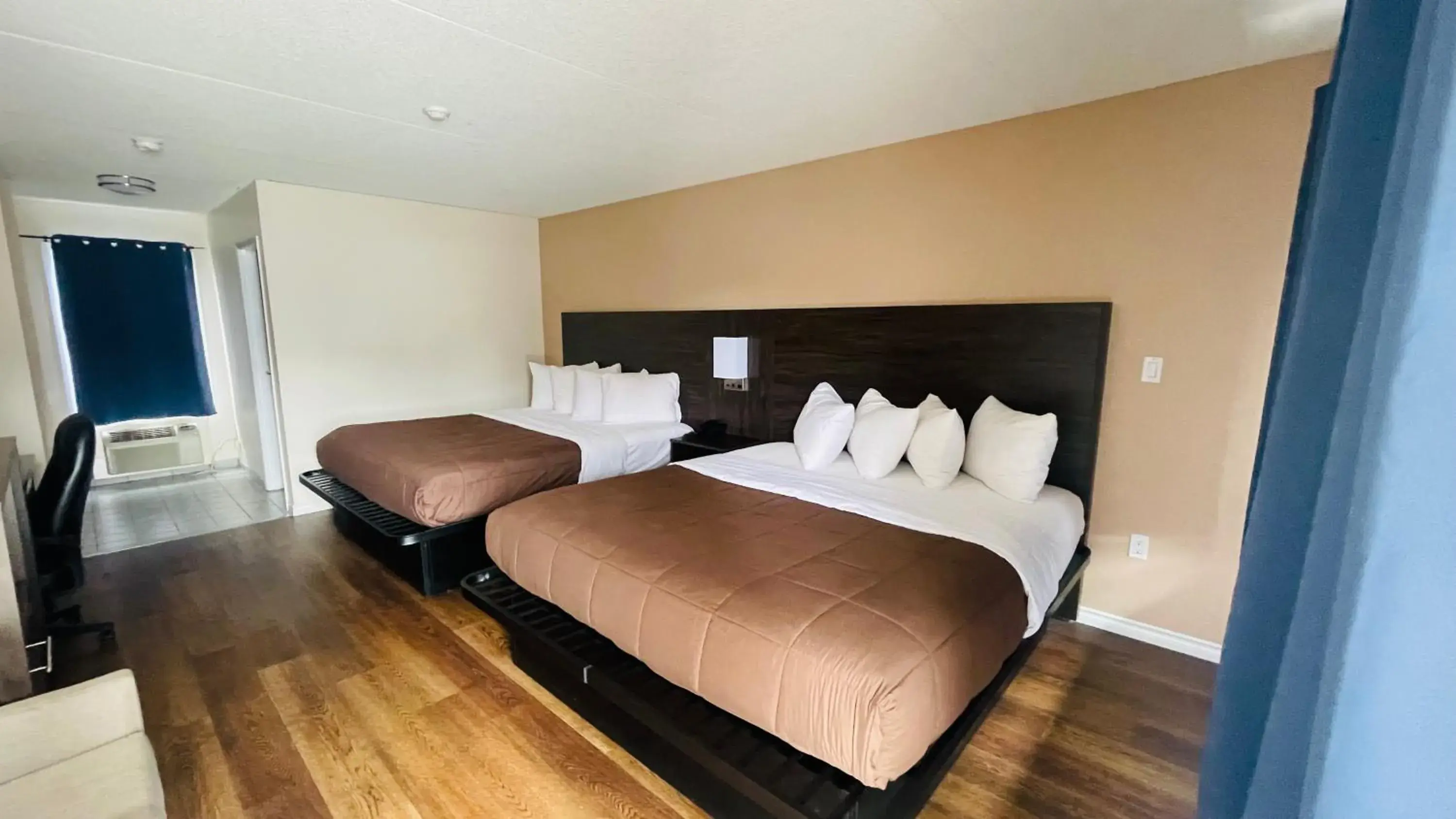 King Room with Two King Beds in Falls Lodge & Suites King Room with Two King Beds in Falls Lodge & Suites