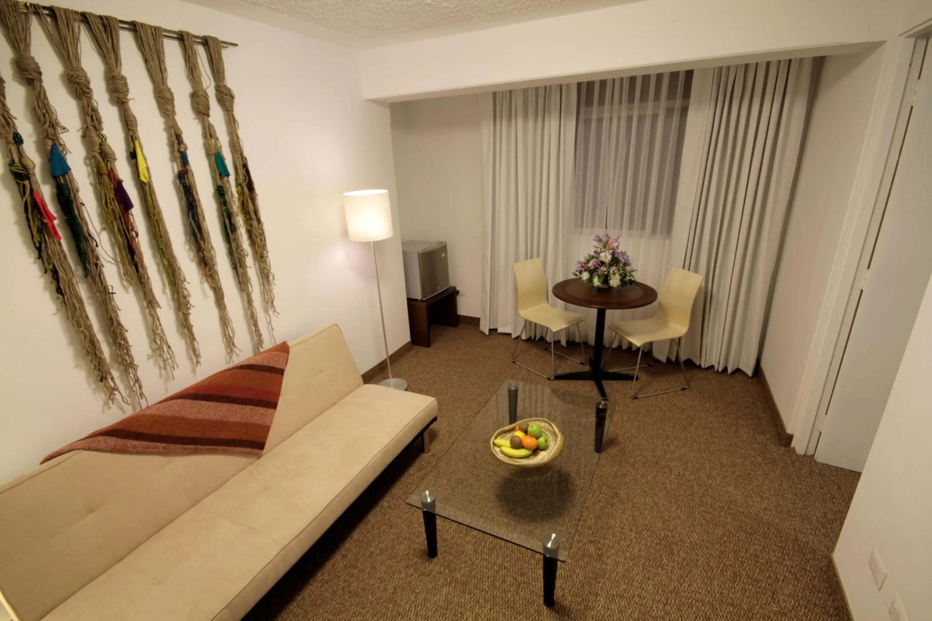 Living room, Bed in Tierra Viva Puno Plaza