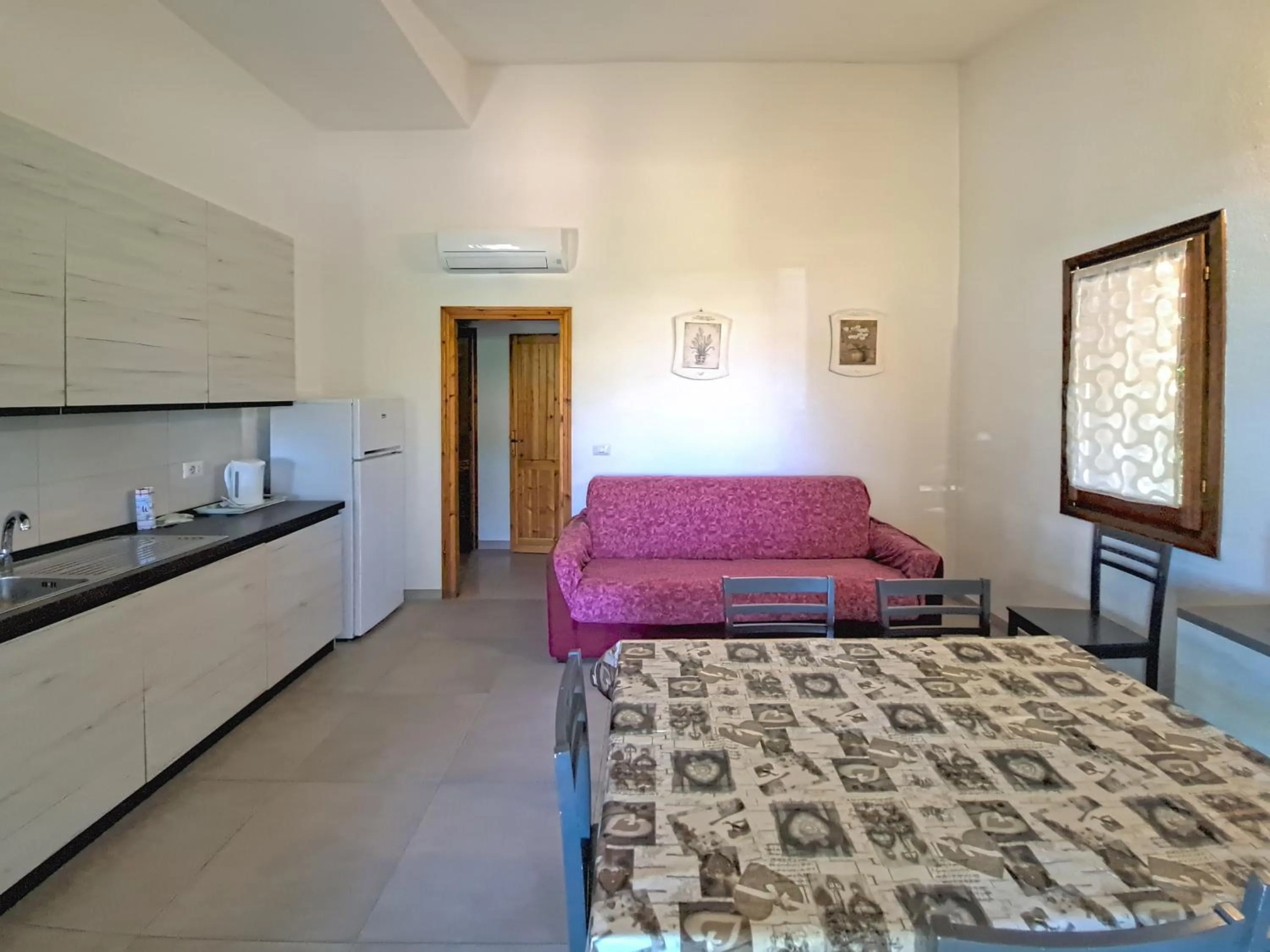 Kitchen or kitchenette, Bed in Centro Residenziale Le Canne