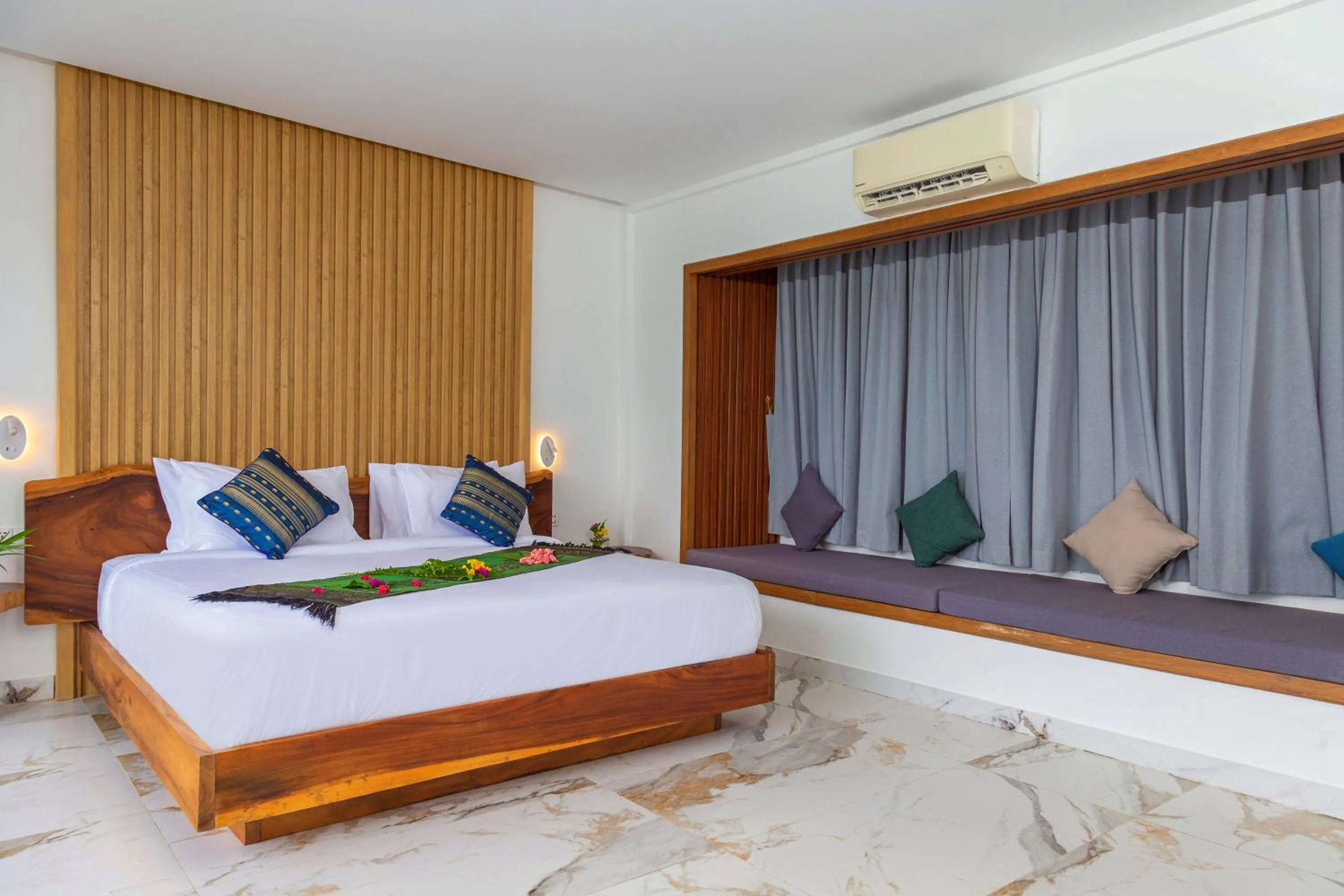 Bed in Pearl Beach Resort & Spa