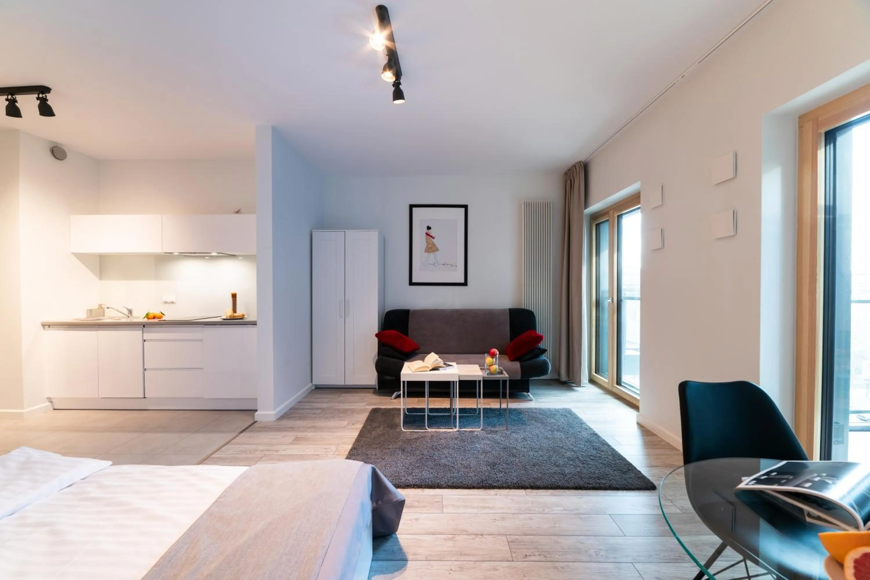 Seating area, Bed in Mennica Central Apartments