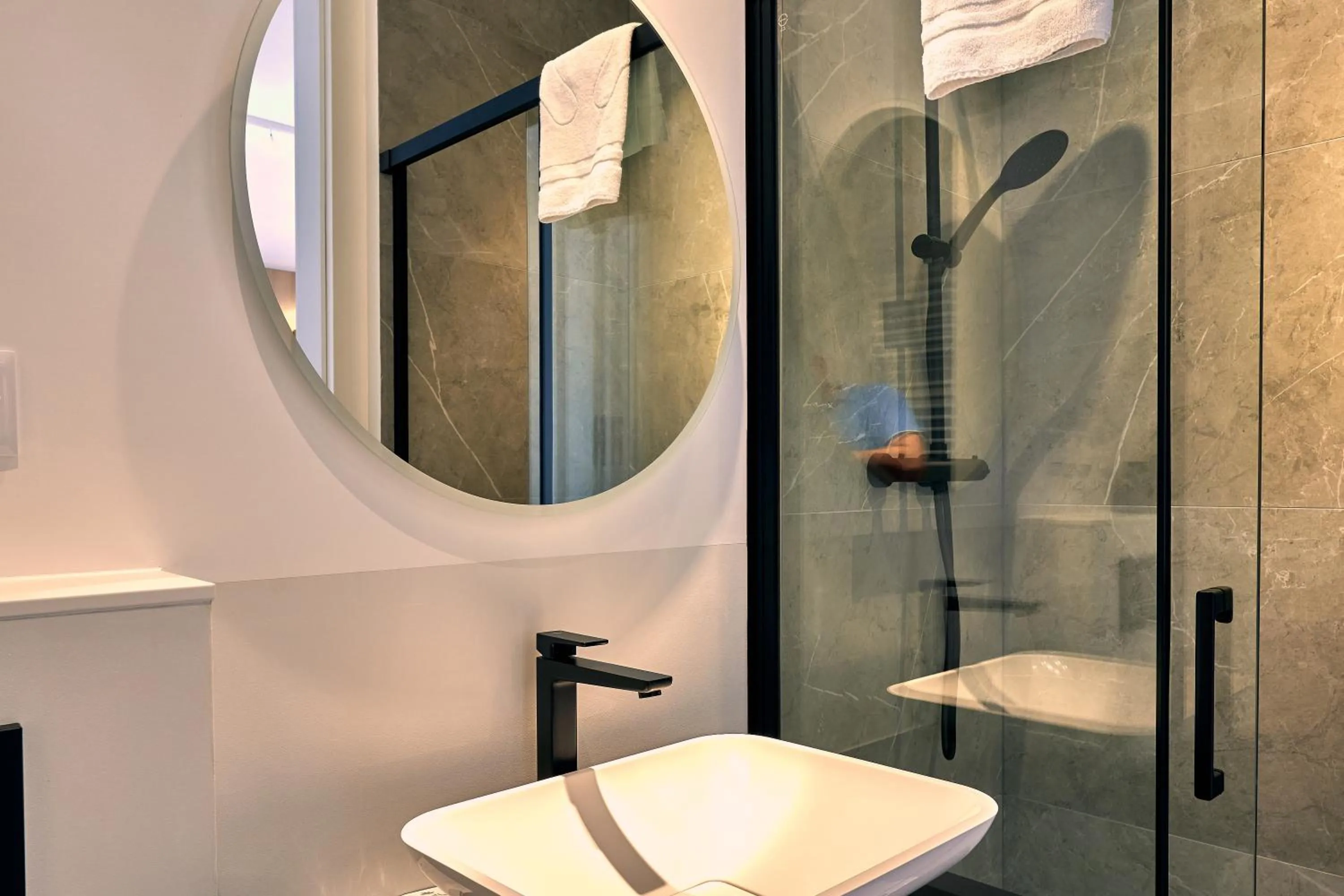 Shower in Mennica Central Apartments