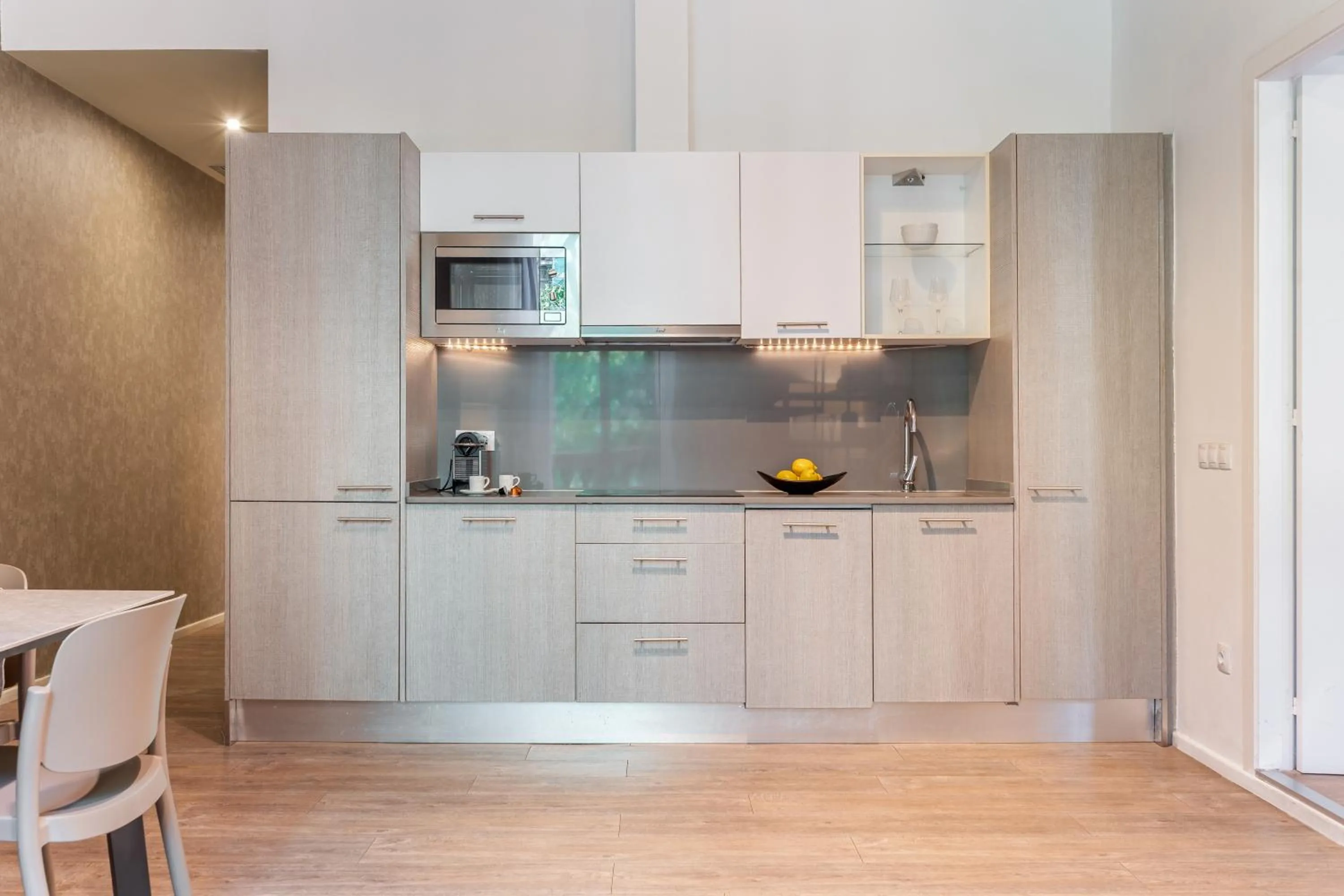 Kitchen or kitchenette in Aspasios Rambla Catalunya Apartments