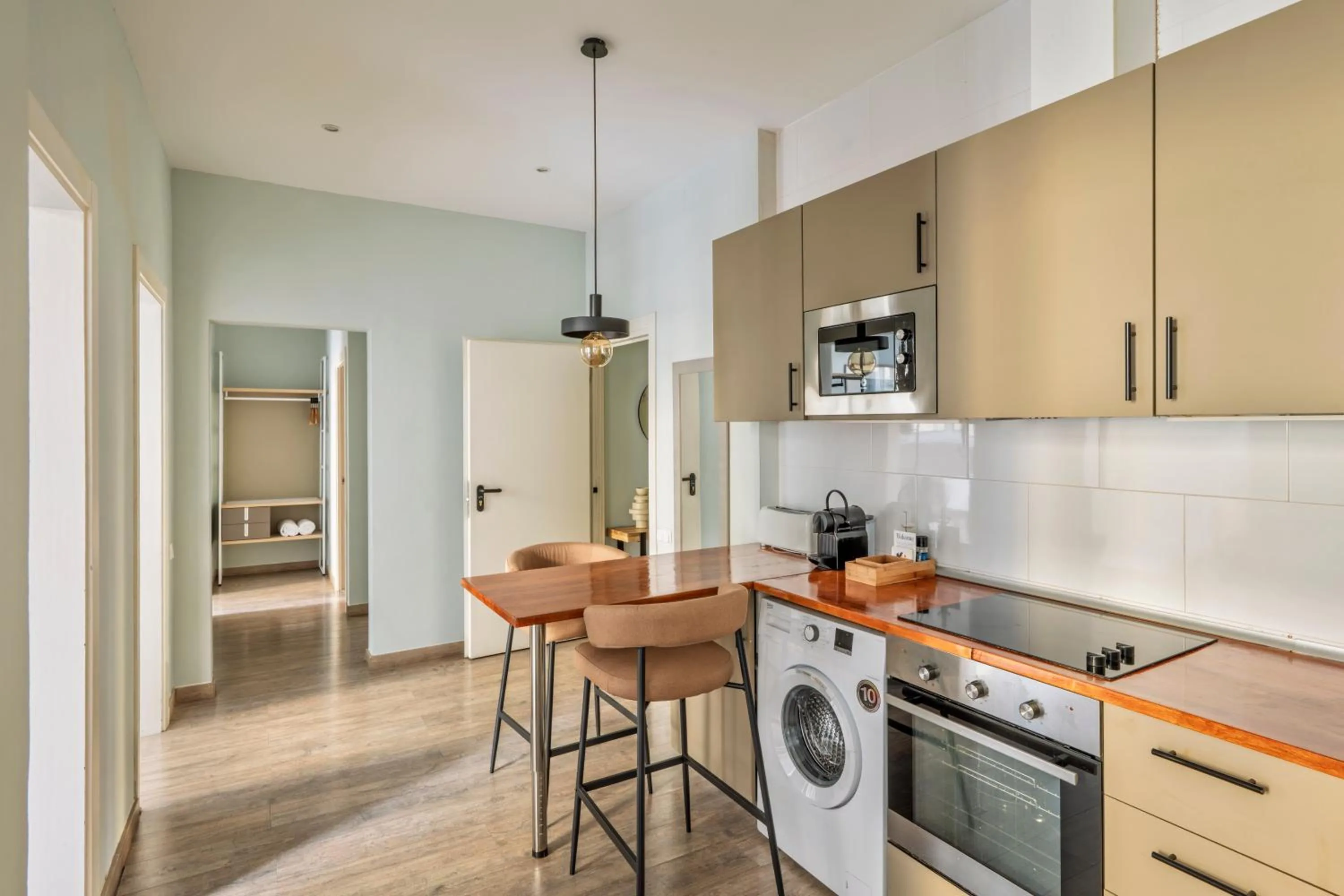 Kitchen or kitchenette in Aspasios Rambla Catalunya Apartments