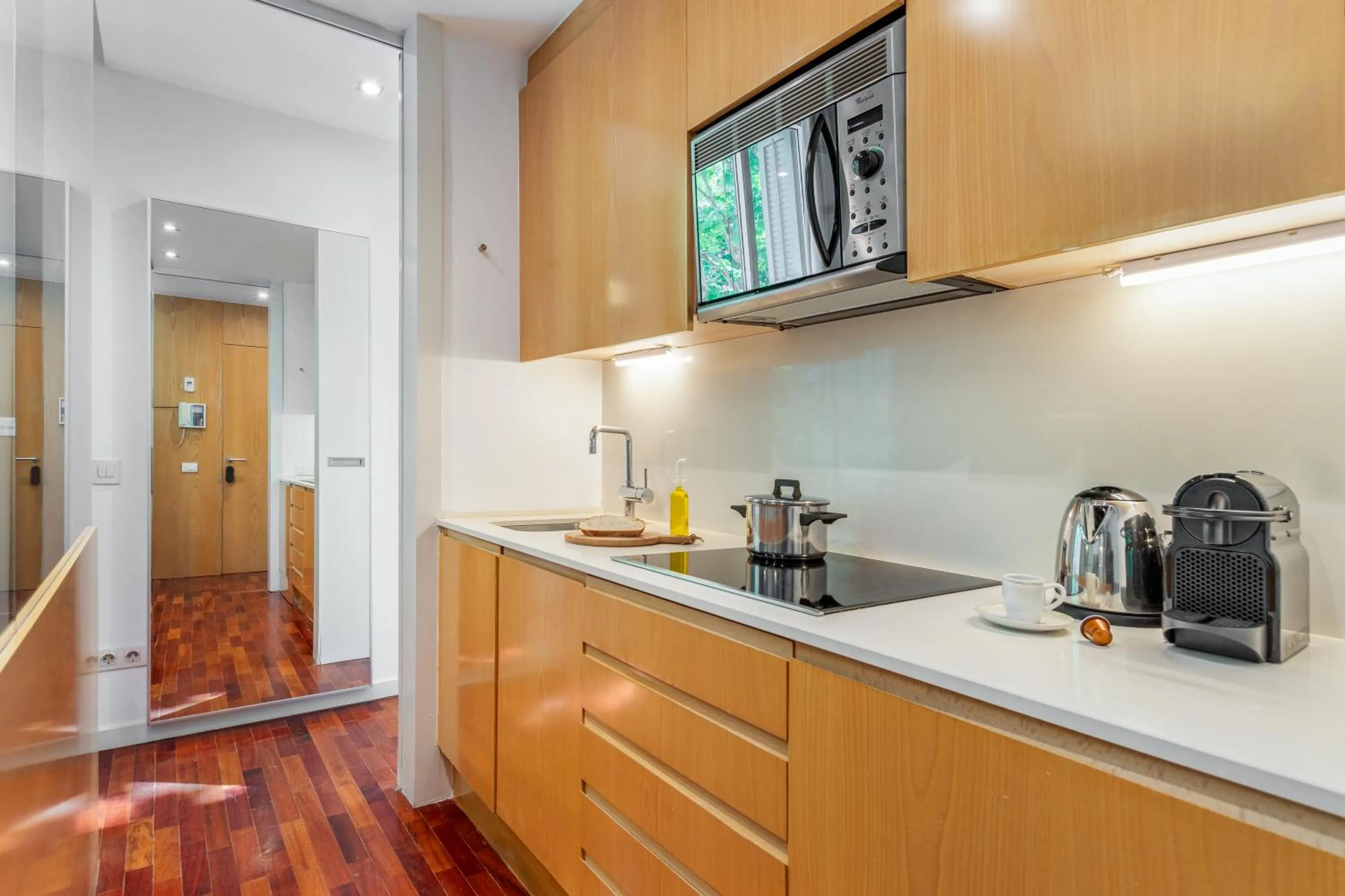 Kitchen or kitchenette in Aspasios Rambla Catalunya Apartments