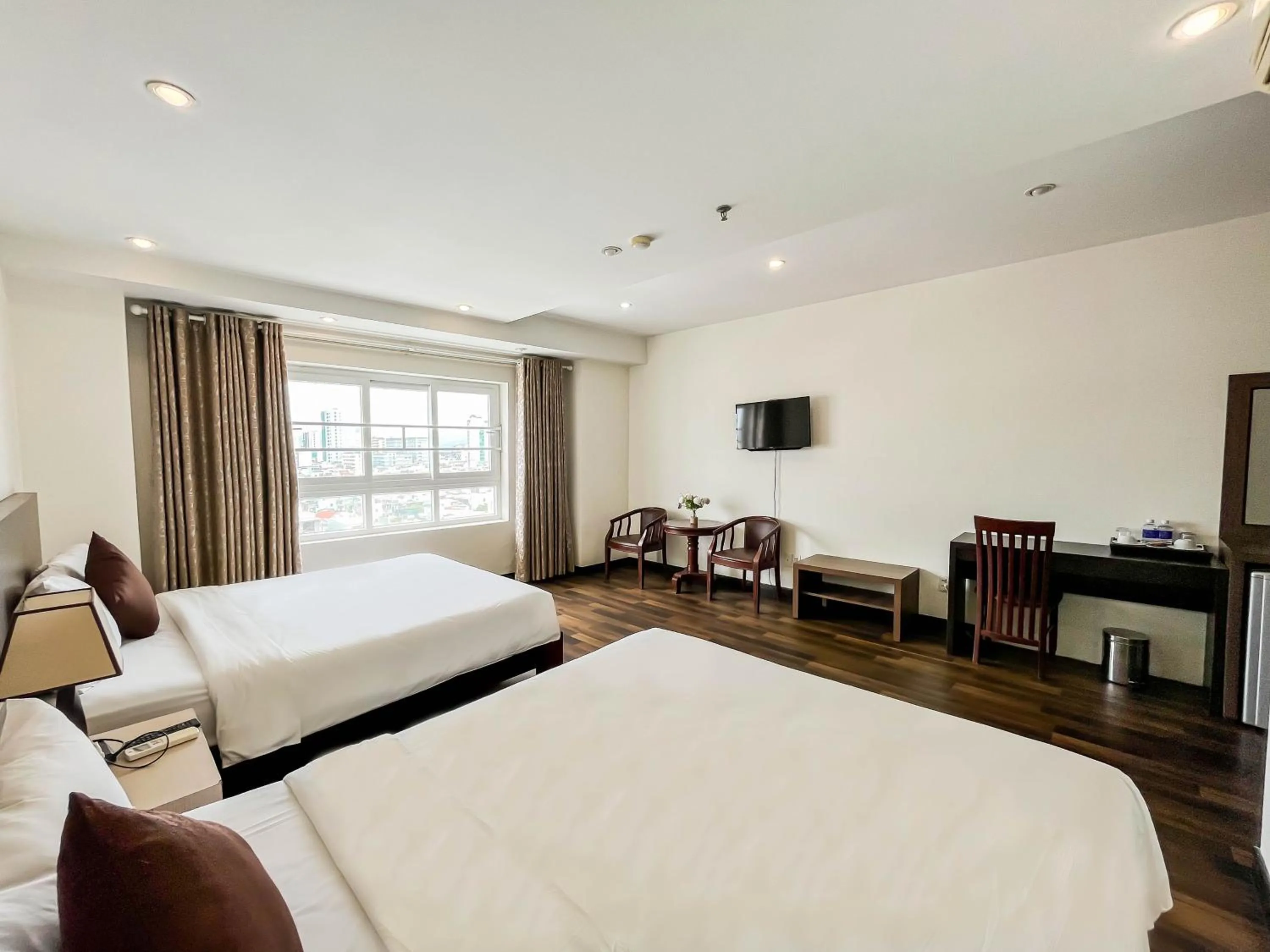 Bed in Quoc Cuong Center Da Nang Hotel by Haviland