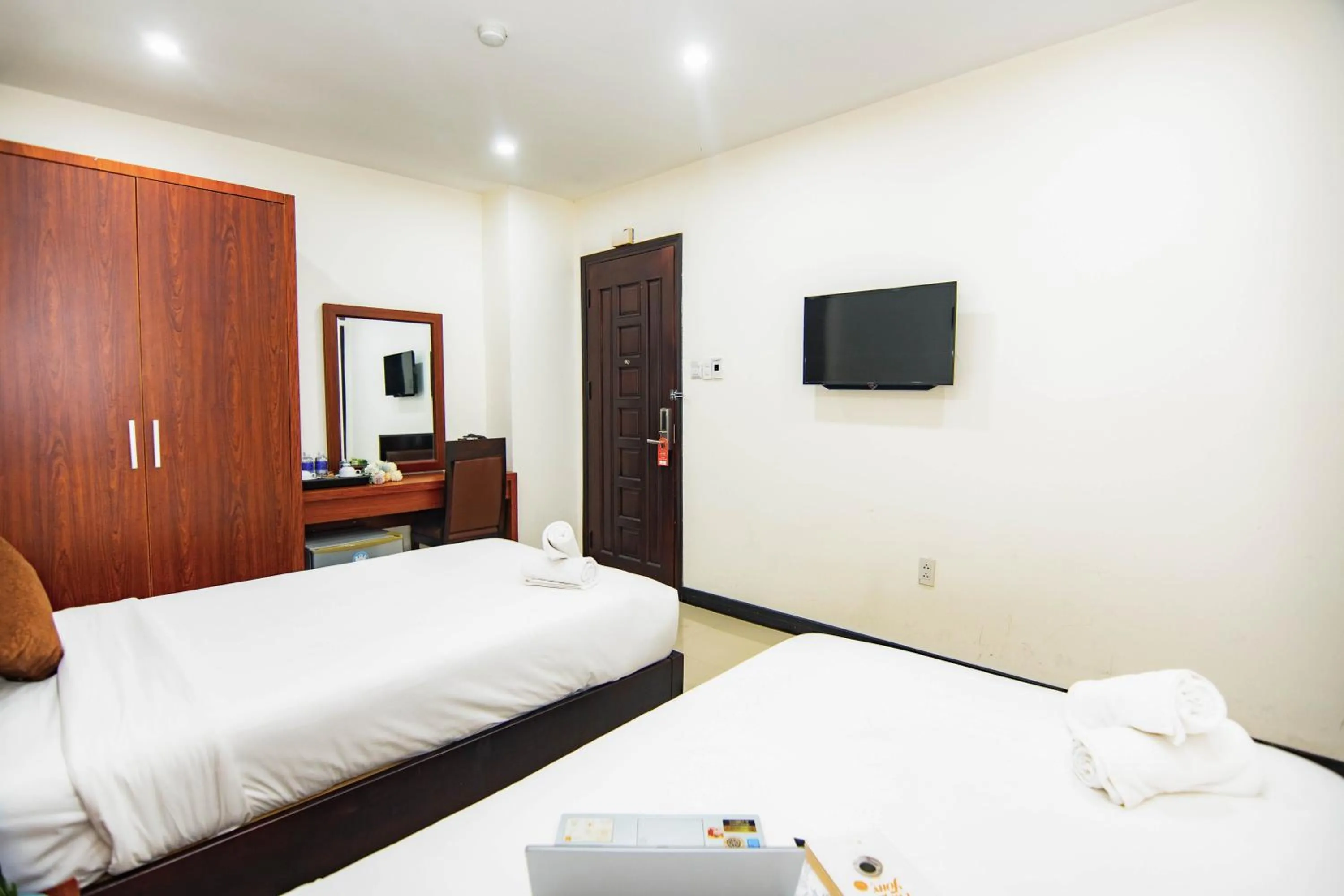 Bed in Quoc Cuong Center Da Nang Hotel by Haviland