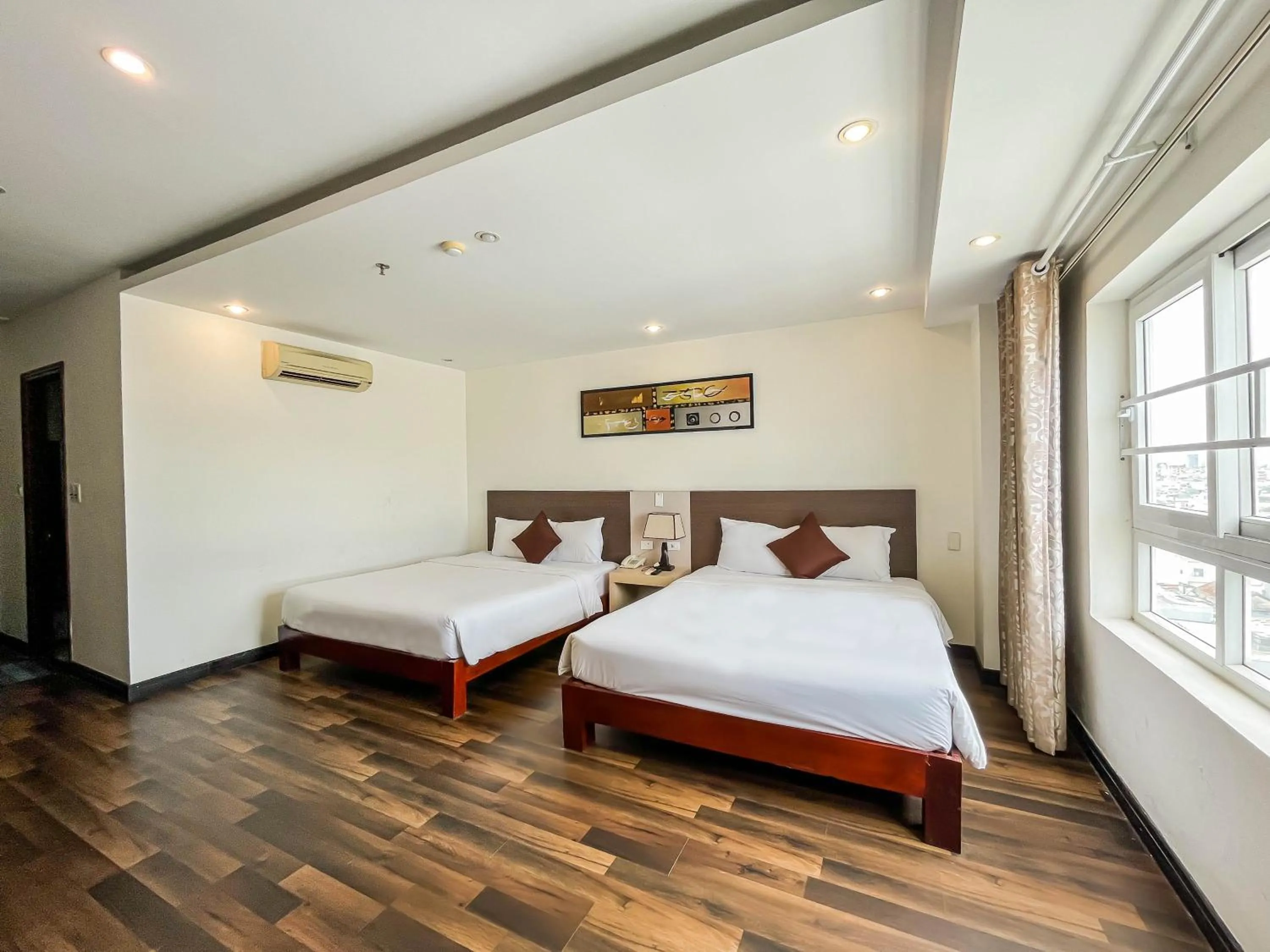 Bed in Quoc Cuong Center Da Nang Hotel by Haviland