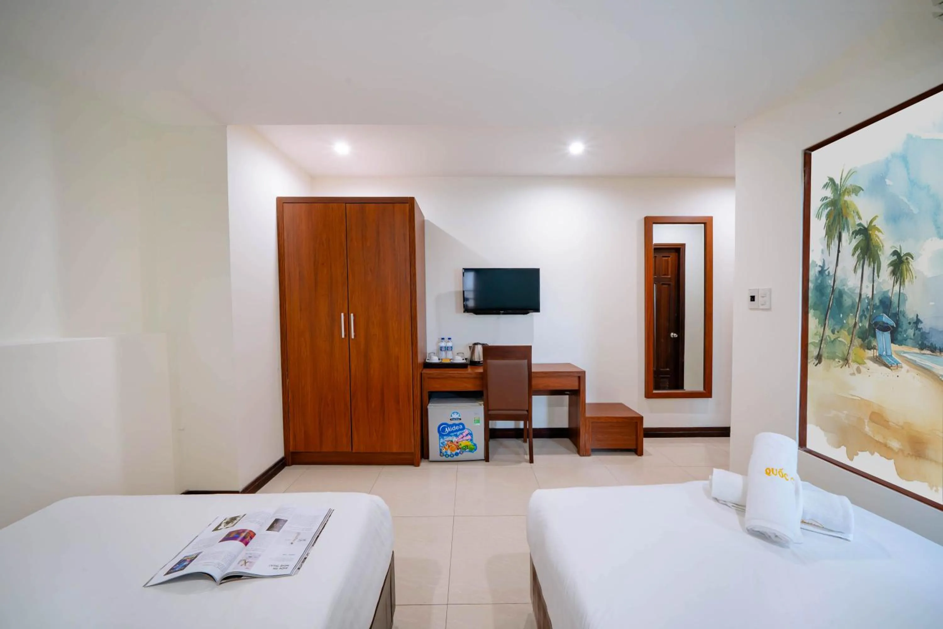 Bed in Quoc Cuong Center Da Nang Hotel by Haviland