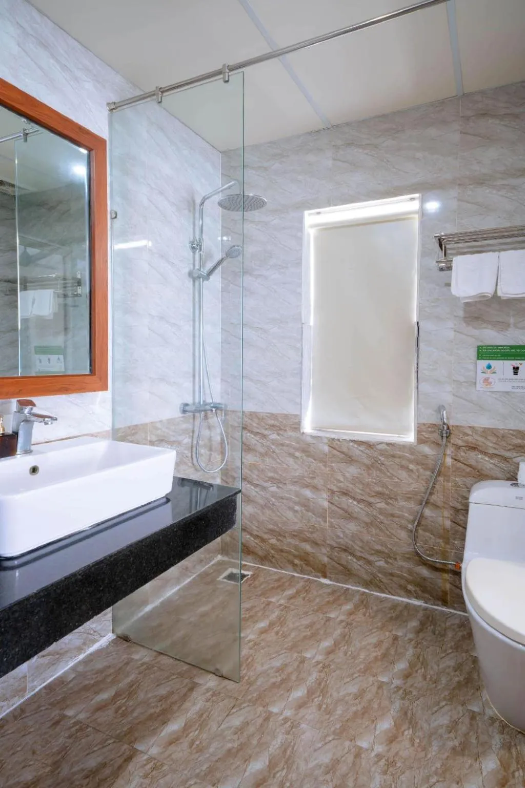 Bathroom in Quoc Cuong Center Da Nang Hotel by Haviland