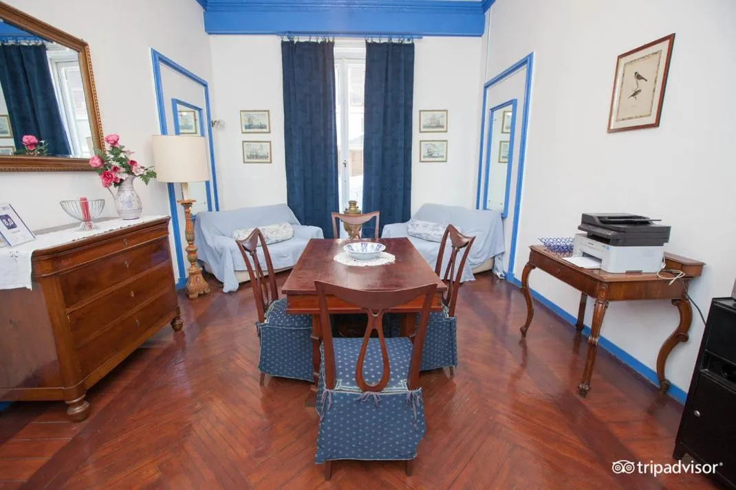 Communal lounge/ TV room in Olympia Hotel