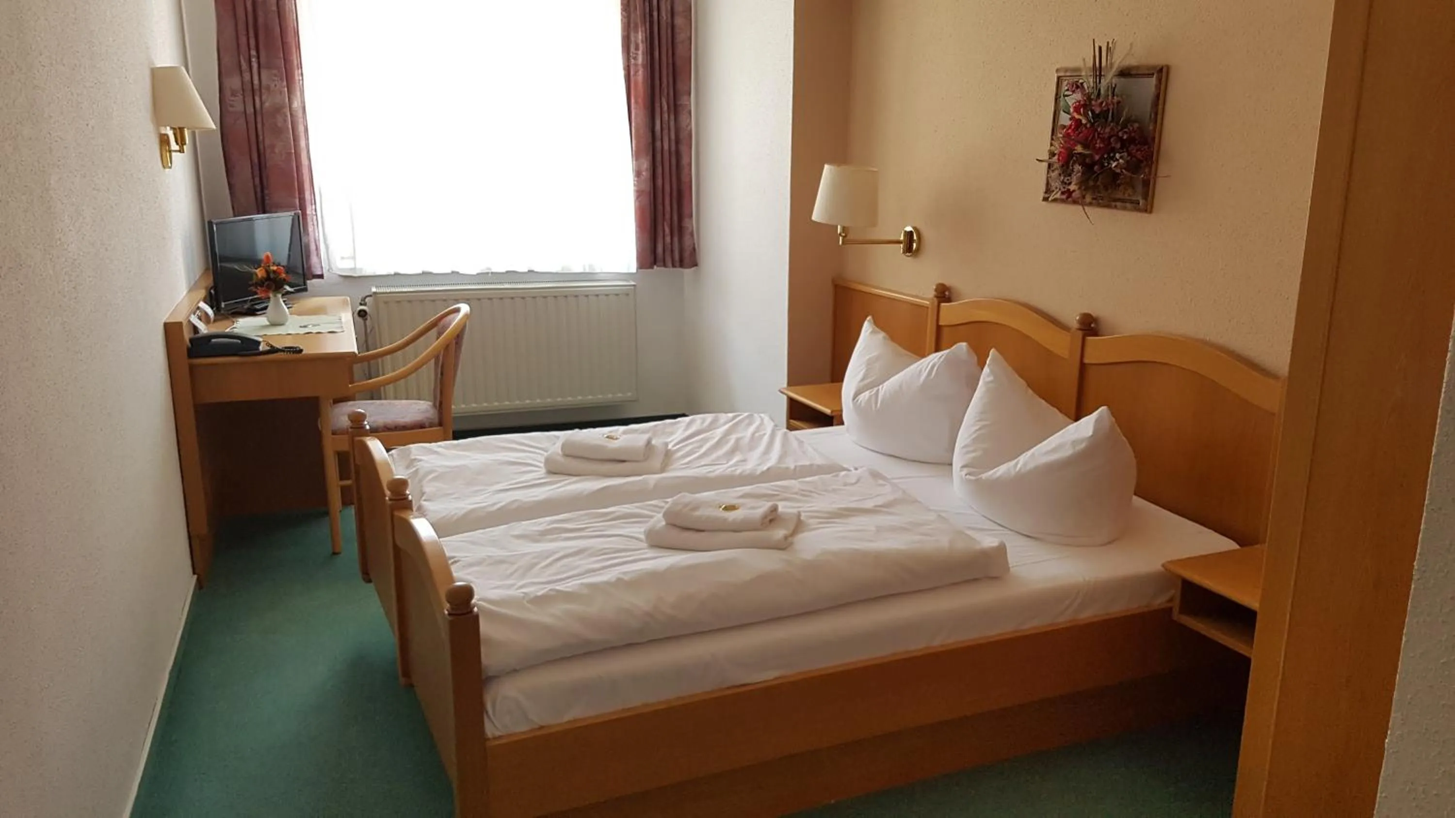 Bed in Hotel Sachsenhof