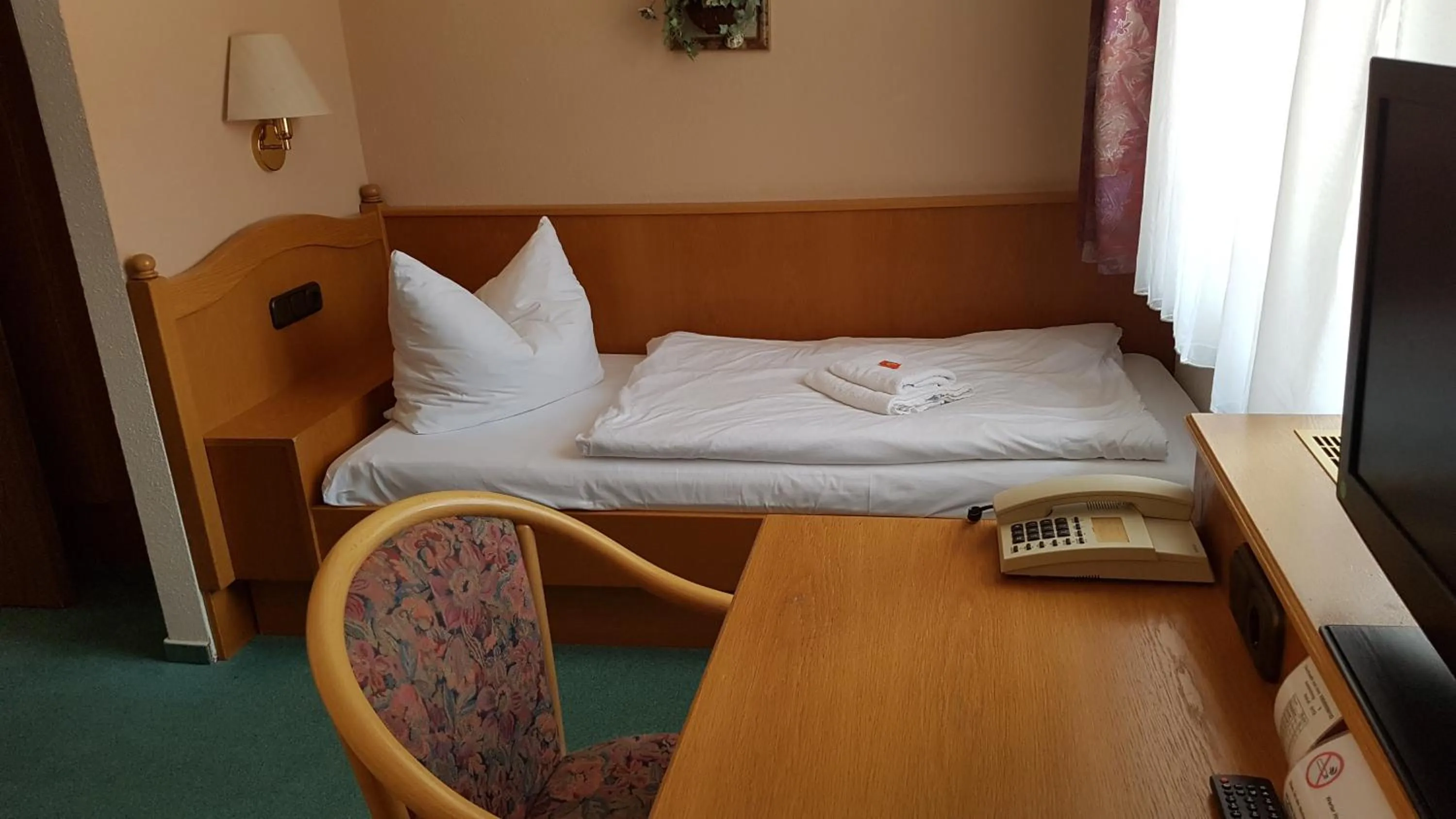Bed in Hotel Sachsenhof