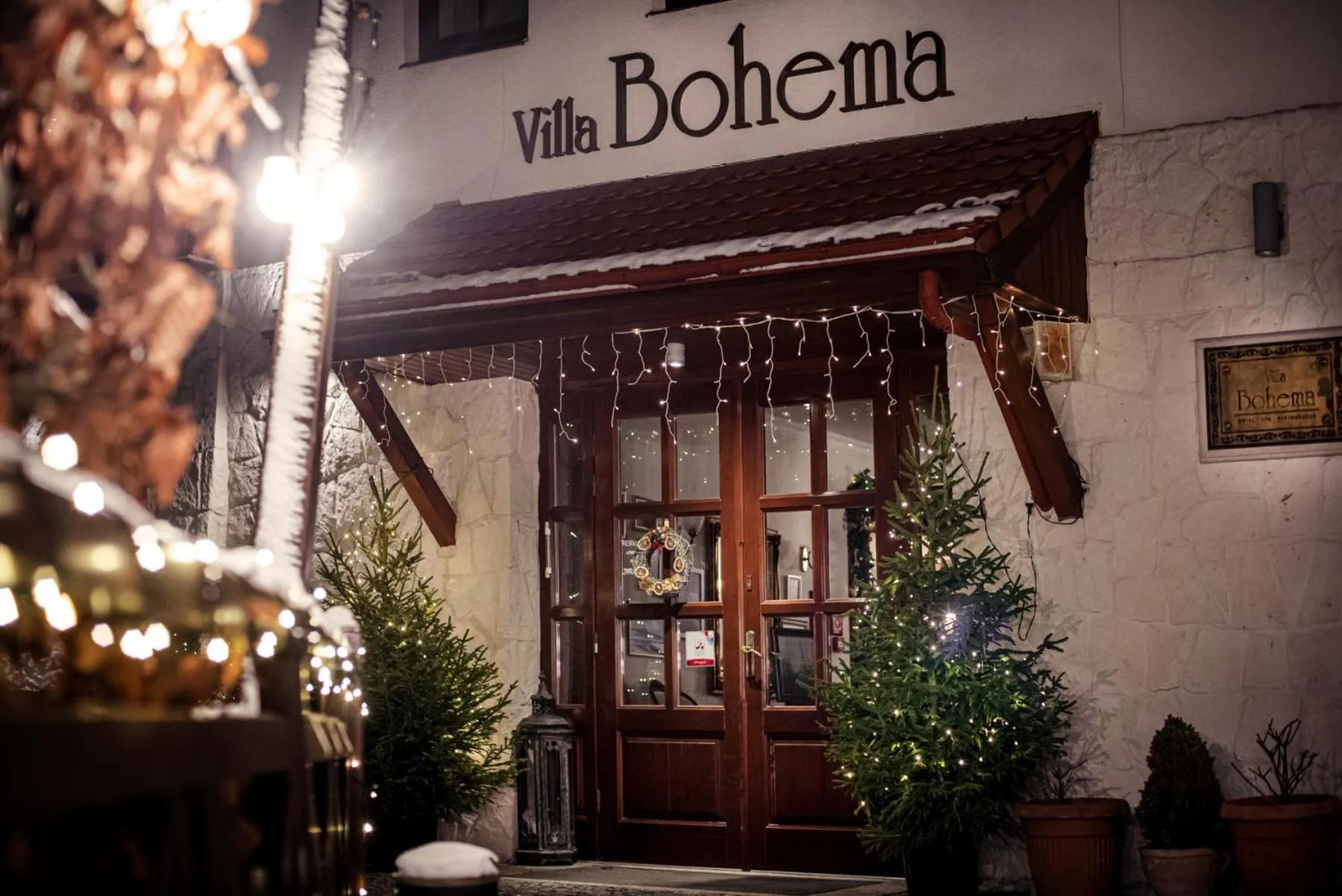 Property logo or sign in Hotel Villa Bohema